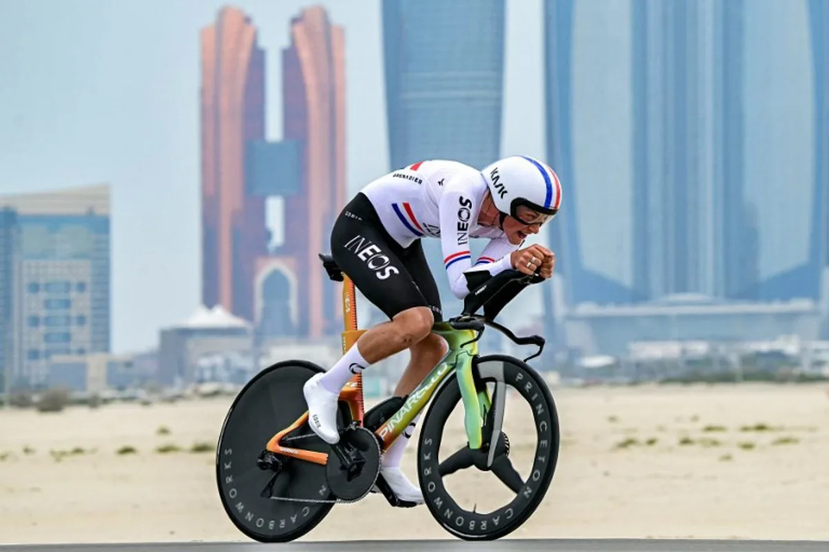 INEOS Grenadiers' British rider Joshua Tarling cycles during the second stage of the UAE Tour cycling race in al-Hudayriyat island in Abu Dhabi on February 18, 2025.  Giuseppe CACACE / AFP