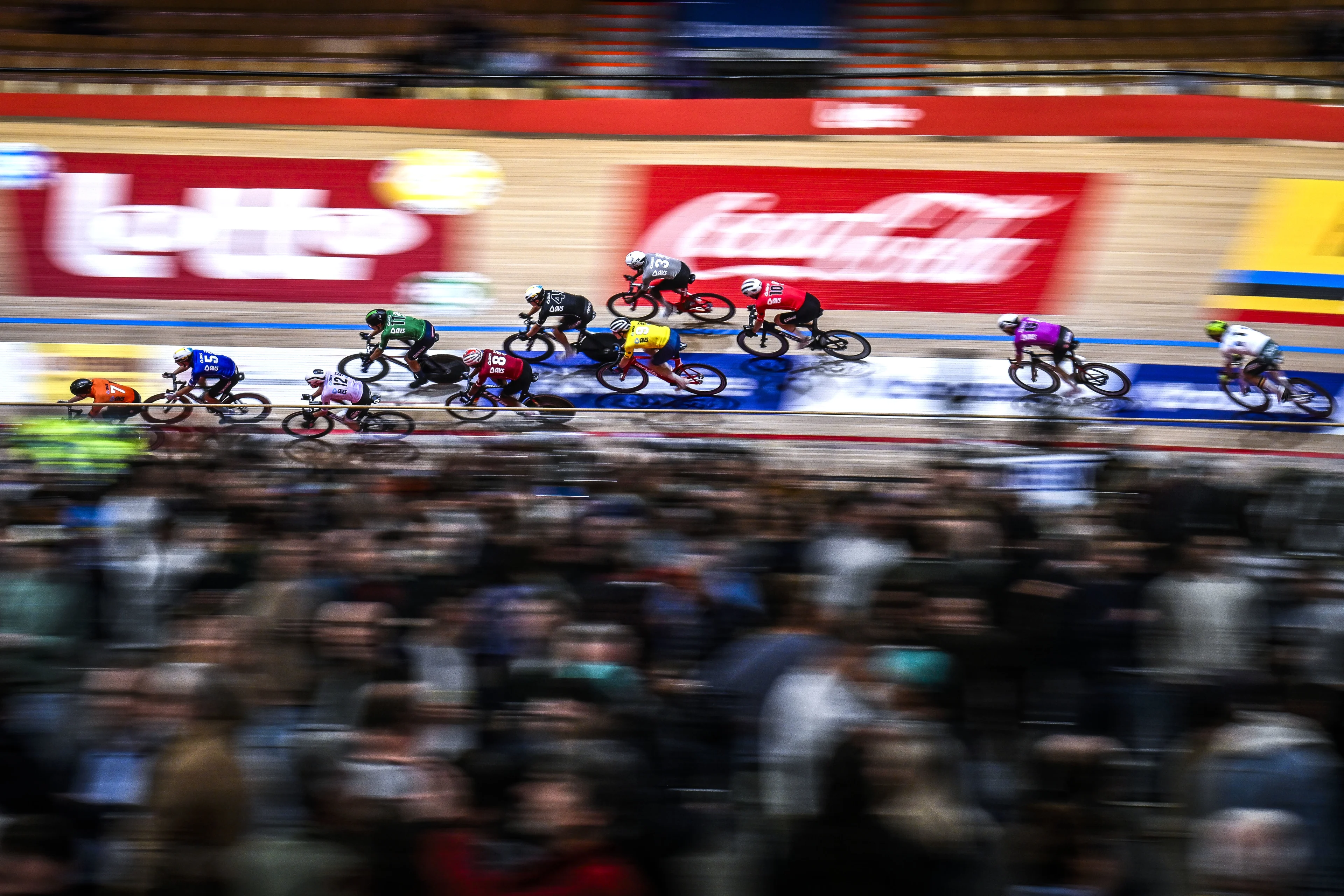 This picture shows a small group of riders in action during the sixth and last day of the Zesdaagse Vlaanderen-Gent six-day indoor track cycling event at the indoor cycling arena 't Kuipke, Sunday 17 November 2024, in Gent. BELGA PHOTO TOM GOYVAERTS