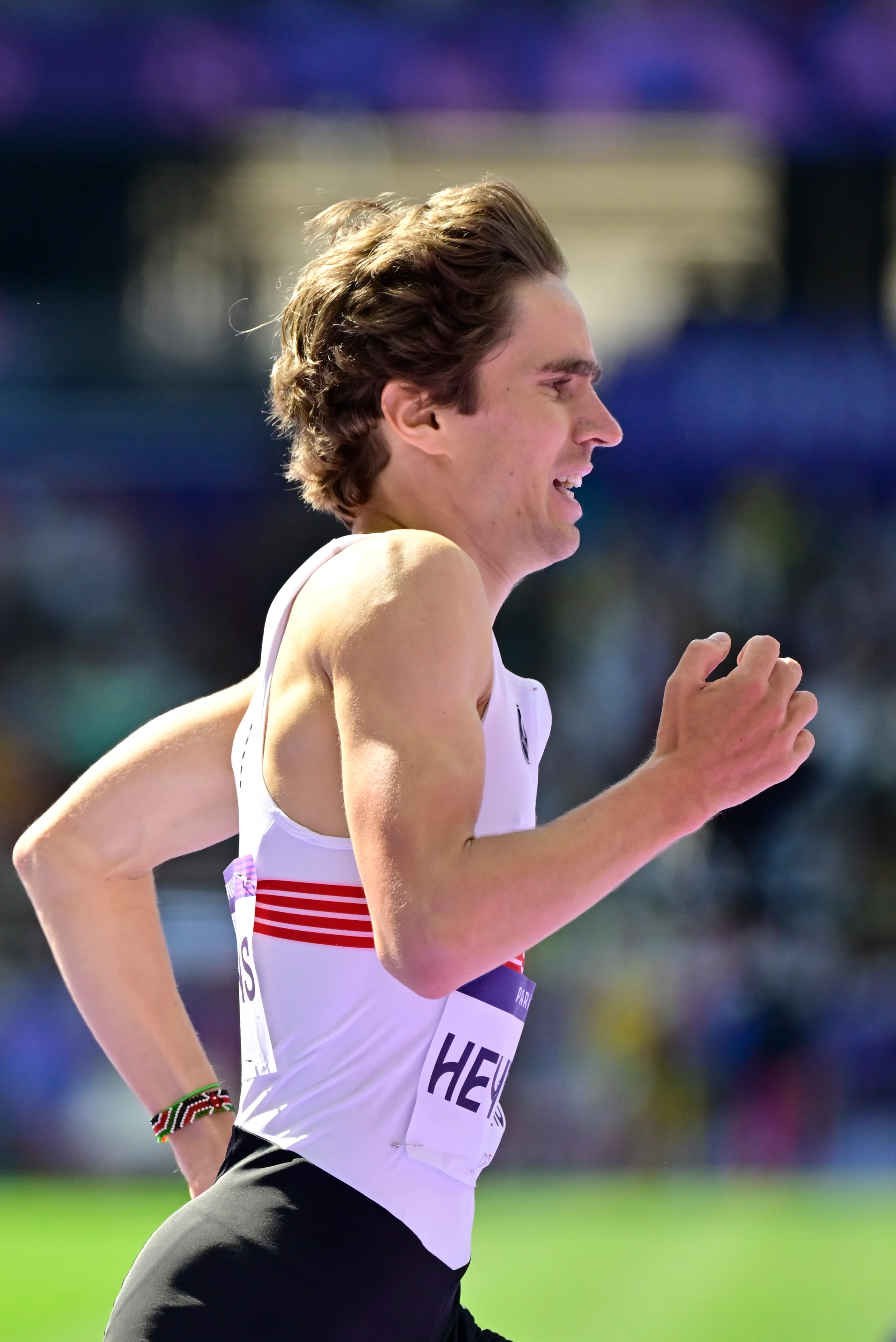 Belgian athlete John Heymans pictured in action during the men's 5000m round 1 of the athletics competition at the Paris 2024 Olympic Games, on Wednesday 07 August 2024 in Paris, France. The Games of the XXXIII Olympiad are taking place in Paris from 26 July to 11 August. The Belgian delegation counts 165 athletes competing in 21 sports. BELGA PHOTO DIRK WAEM