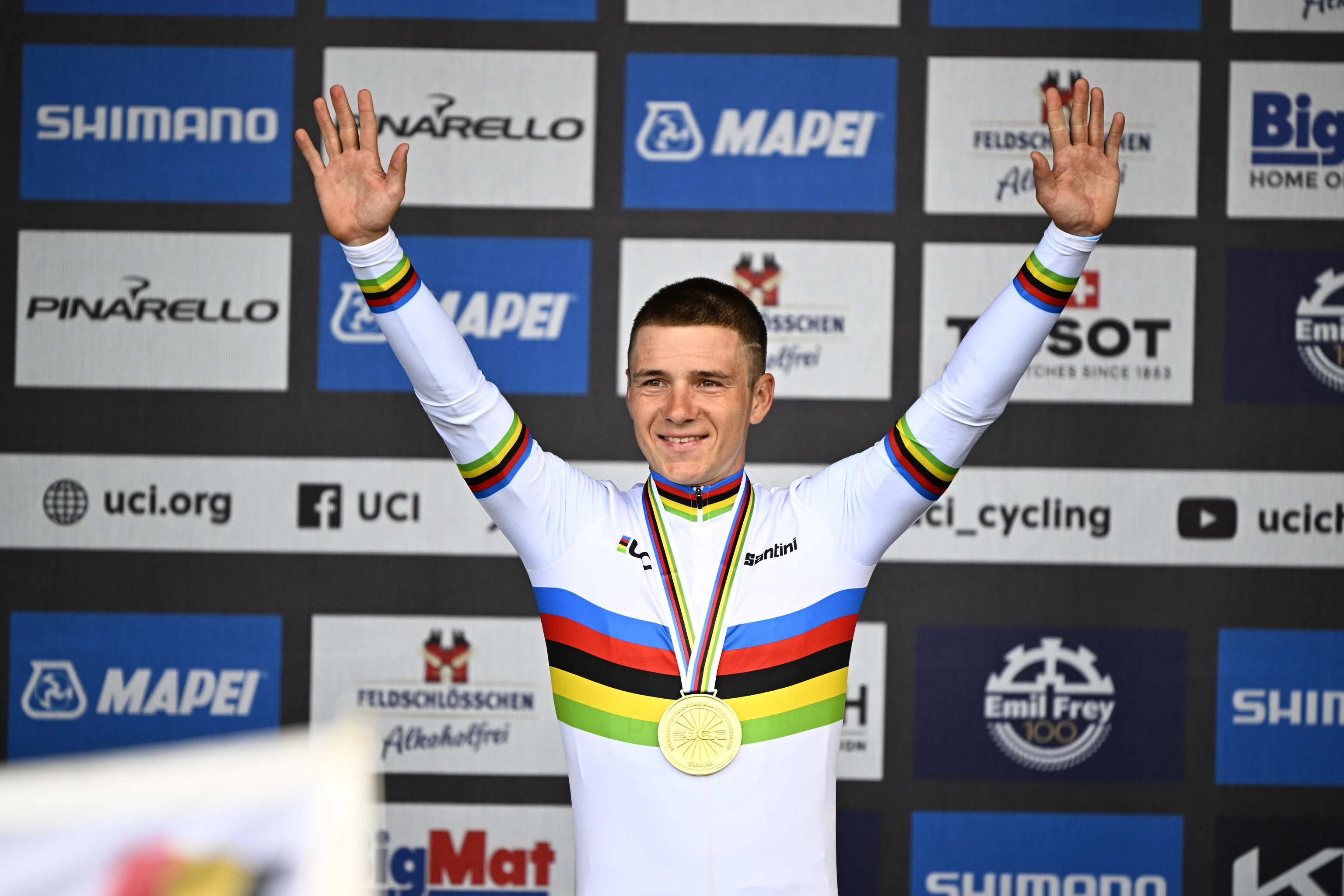 Belgian Remco Evenepoel celebrates on the podium with the world champion jersey at the men elite individual time trial race at the 2024 UCI Road and Para-Cycling Road World Championships, Sunday 22 September 2024, in Zurich, Switzerland. The Worlds are taking place from 21 to 29 September. BELGA PHOTO JASPER JACOBS