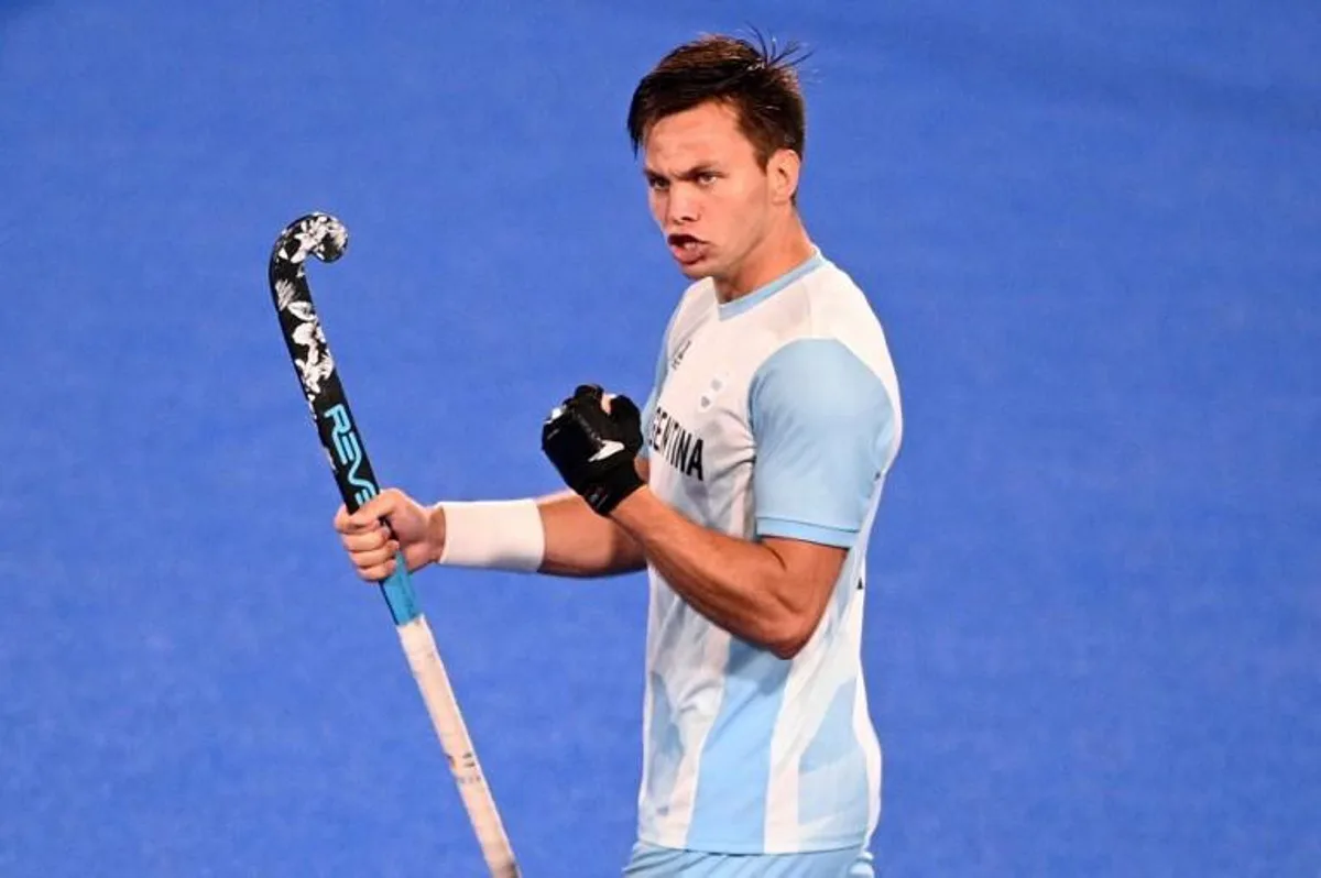 Argentina's Nicolas Santiago Keenan celebrates after scoring against New Zealand during their men's pool A match of the Tokyo 2020 Olympic Games field hockey competition, at the Oi Hockey Stadium in Tokyo on July 30, 2021. MARTIN BUREAU / AFP