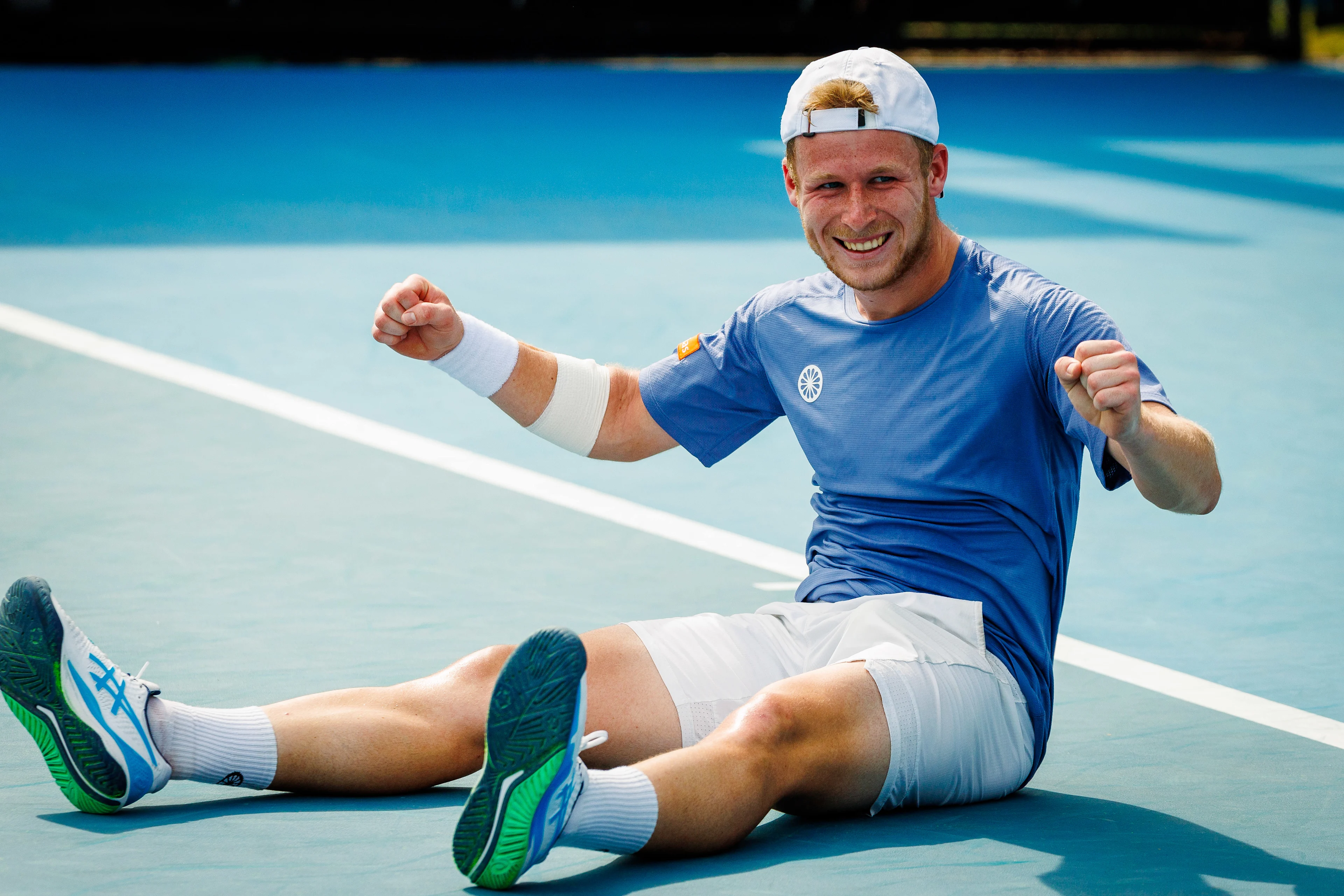 Belgian Gauthier Onclin celebrates during a tennis match against American McDonald, in the third round of the qualifiers for the men's singles tournament, at the 'Australian Open' Grand Slam tennis tournament, Thursday 09 January 2025 in Melbourne Park, Melbourne, Australia. The 2024 edition of the Australian Grand Slam takes place from January 14th to January 28th. BELGA PHOTO PATRICK HAMILTON