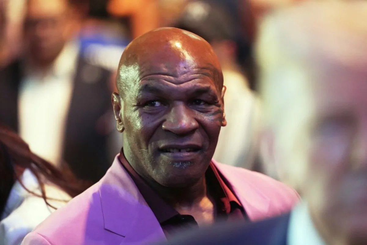 US President Donald Trump (R), and US former professional boxer Mike Tyson (L) attend a UFC 316 event, headlined by a rematch between Georgian mixed martial artist Merab Dvalishvili and US mixed martial artist Sean O'Malley at the Prudential Center in Newark, New Jersey on June 7, 2025. Frank Franklin II / POOL / AFP