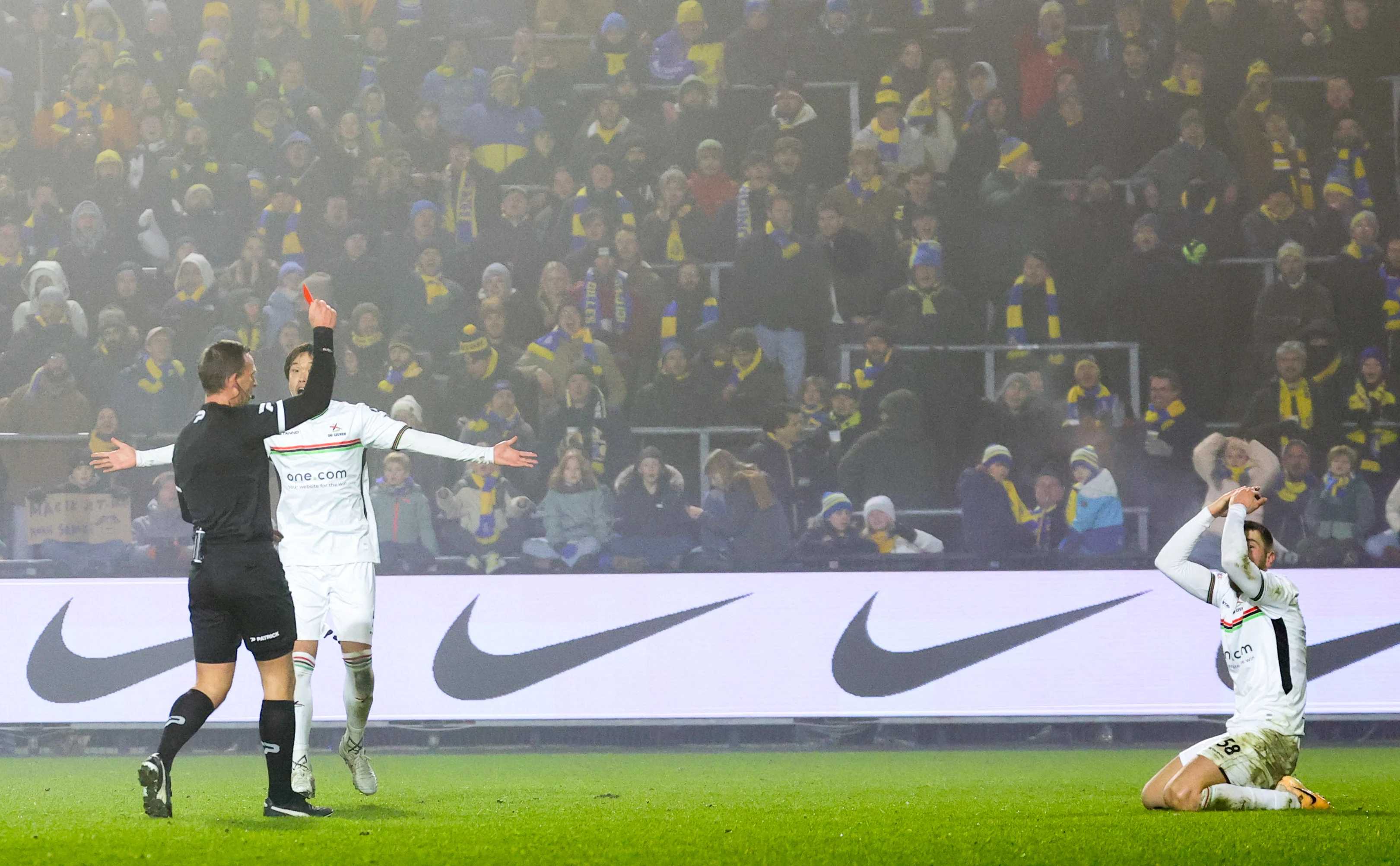 OHL's Hasan Kurucay receives a red card from referee Nathan Verboomen during a soccer match between Royale Union Saint-Gilloise and OH Leuven, Sunday 19 January 2025 in Brussels, on day 22 of the 2024-2025 season of the 'Jupiler Pro League' first division of the Belgian championship. BELGA PHOTO VIRGINIE LEFOUR