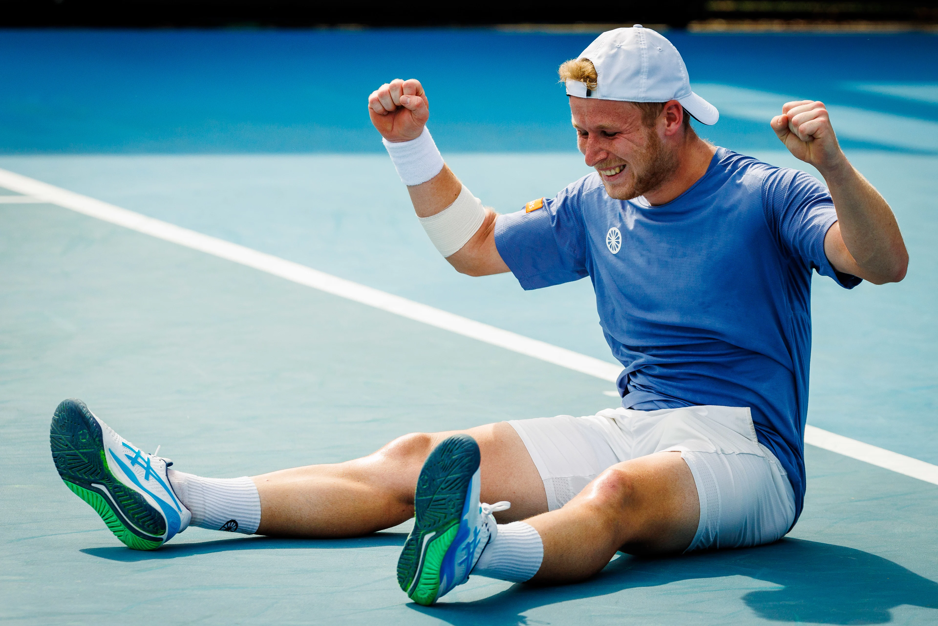 Belgian Gauthier Onclin celebrates during a tennis match against American McDonald, in the third round of the qualifiers for the men's singles tournament, at the 'Australian Open' Grand Slam tennis tournament, Thursday 09 January 2025 in Melbourne Park, Melbourne, Australia. The 2024 edition of the Australian Grand Slam takes place from January 14th to January 28th. BELGA PHOTO PATRICK HAMILTON