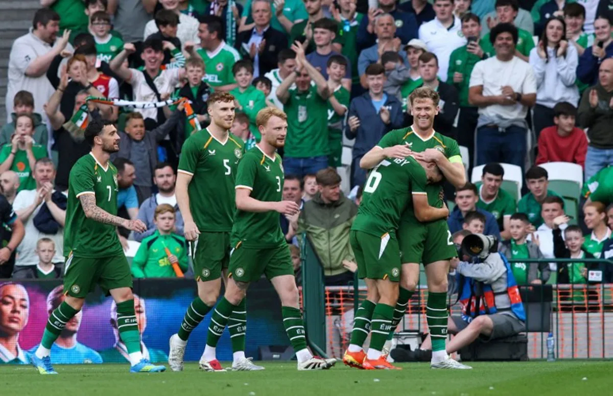 epublic of Ireland's defender Nathan Collins (R) celebrates scoring the team's first goal during the international friendly football match between the Republic of Ireland and Qatar, at the Aviva Stadium in Dublin, Ireland on May 28, 2026. Paul Faith / AFP