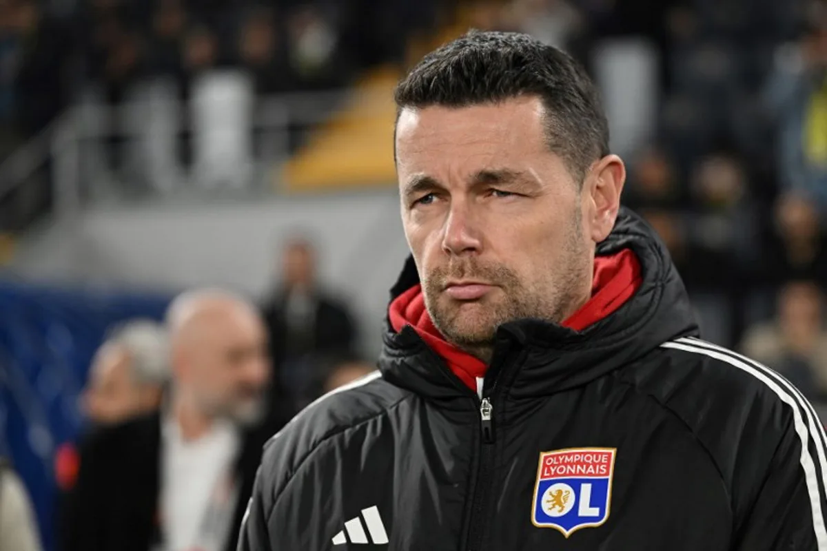 (FILES) Lyon's French coach Pierre Sage looks on before the start of the UEFA Europa League, league phase football match between Fenerbahce and Olympique Lyonnais (OL) at the Sukru Saracoglu Stadium in Istanbul on January 23, 2025.  Lyon coach Pierre Sage was sacked on January 27, 2025, just over a year after taking over, paying for his side's 1-1 draw at Nantes in Ligue 1 at the weekend, a source close to the matter said, confirming a report in L'Equipe. Yasin AKGUL / AFP