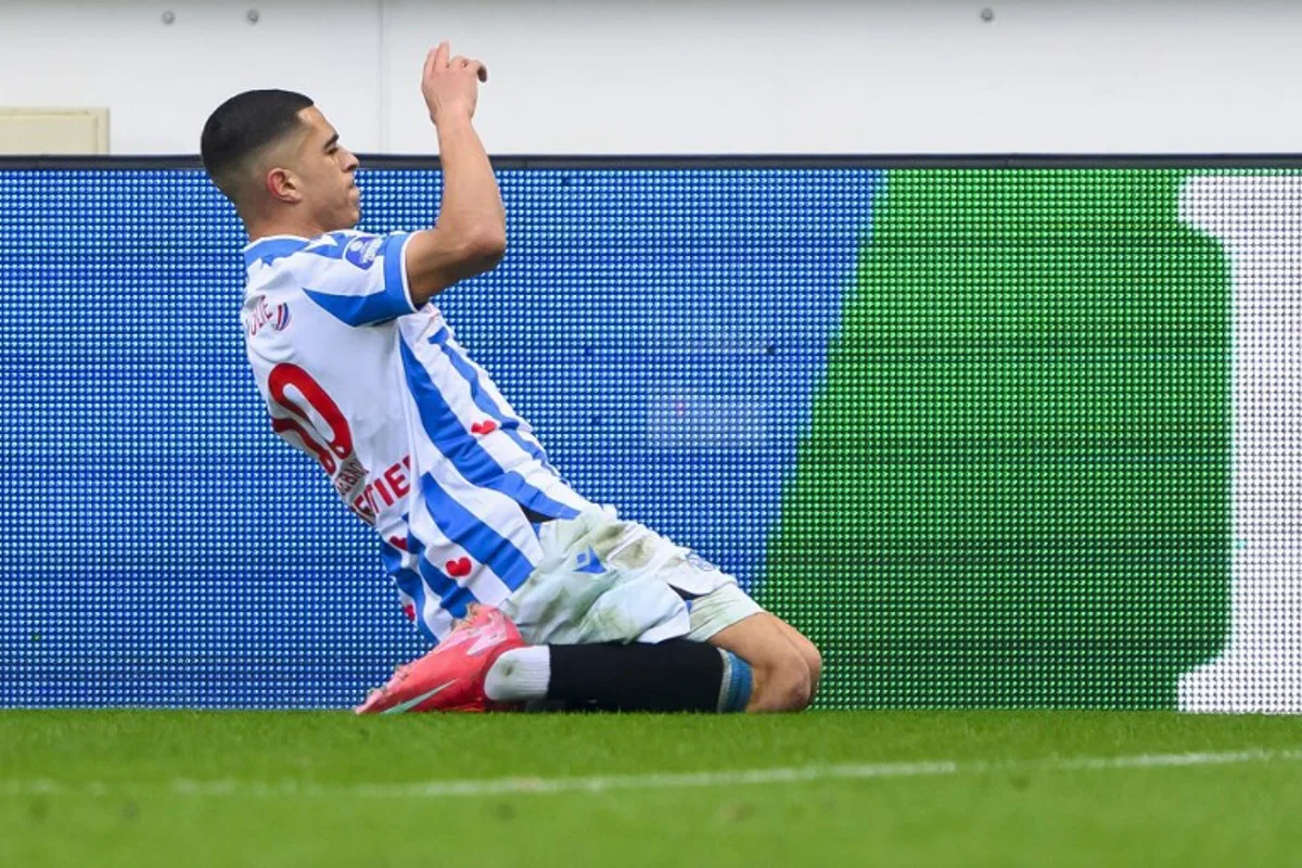 SC Heerenveen's Belgian forward #10 Ilias Sebaoui celebrates after scoring Heerenveen's second goal during the Dutch Eredivisie football match between SC Heerenveen and AZ Alkmaar at the Abe Lenstra Stadium in Heerenveen on March 2, 2025. Cor Lasker / ANP / AFP