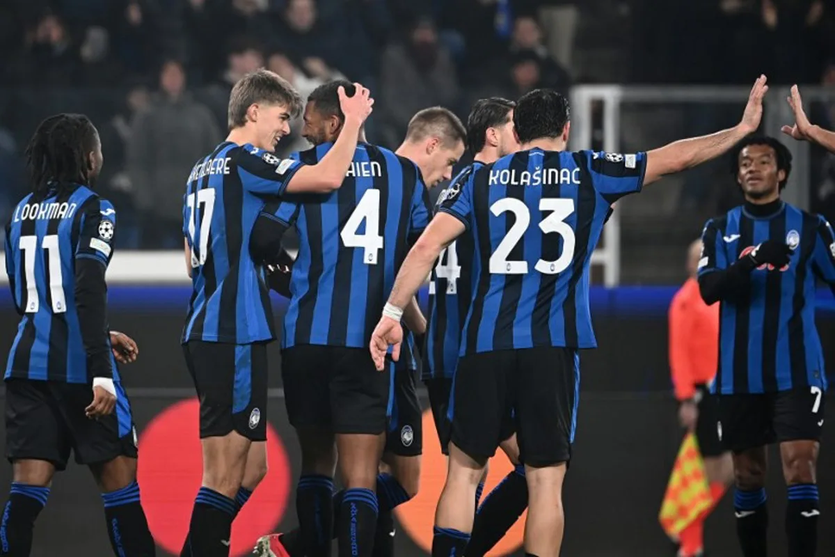 Atalanta's Belgian midfielder #17 Charles De Ketelaere and Atalanta's Sweden's defender #04 Isak Hien celebrate with teammates after Atalanta's Croatian midfielder #08 Mario Pasalic scored his team's second goal during the UEFA Champions League football match between Atalanta and Sturm Graz at the Gewiss Stadium in Bergamo, on January 21, 2025.  Isabella BONOTTO / AFP