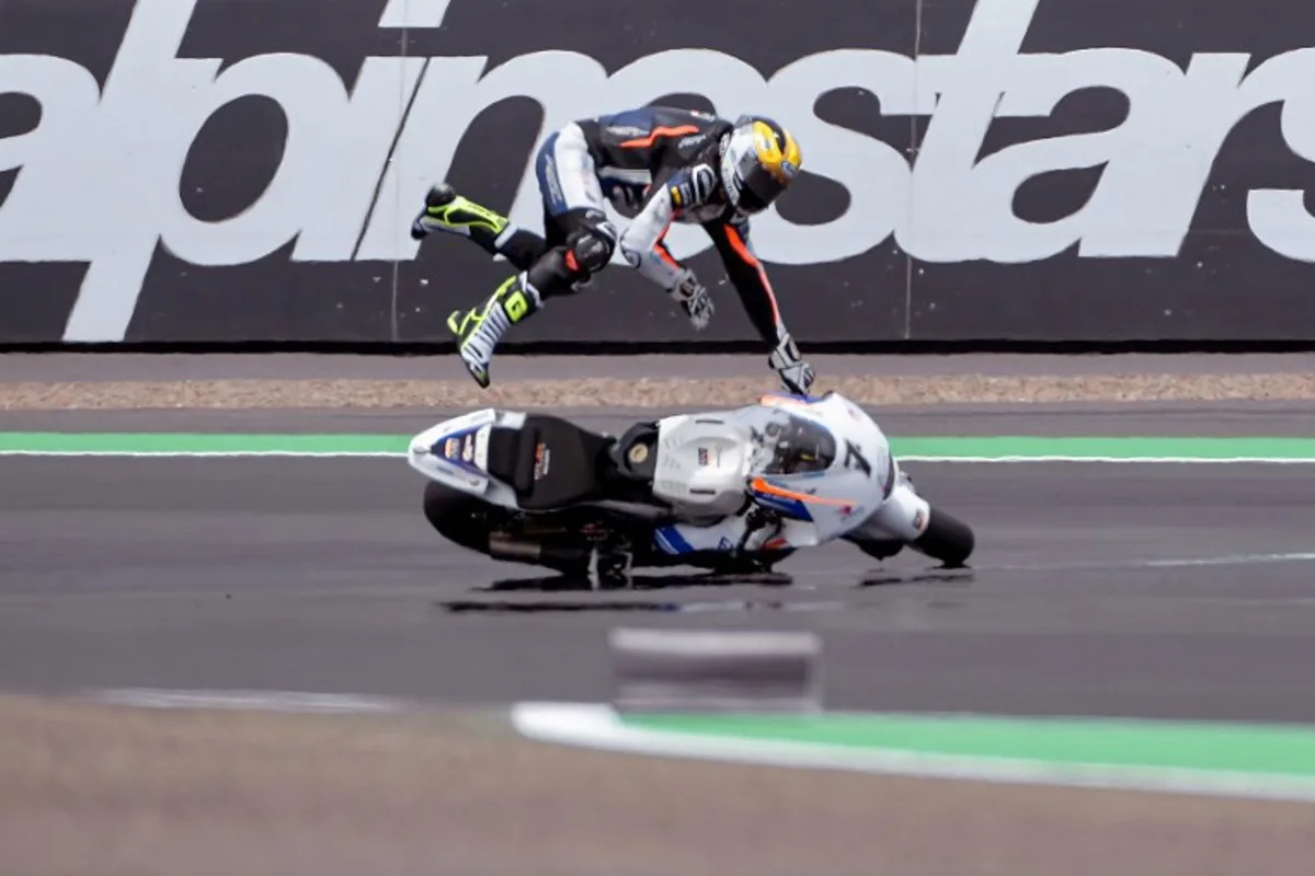 RW Racing GP Team's Belgian rider Barry Baltus crashes during the qualifying session for the Indonesian Grand Prix Moto2 race at the Mandalika International Circuit at Kuta Mandalika in Central Lombok on March 19, 2022. BAY ISMOYO / AFP