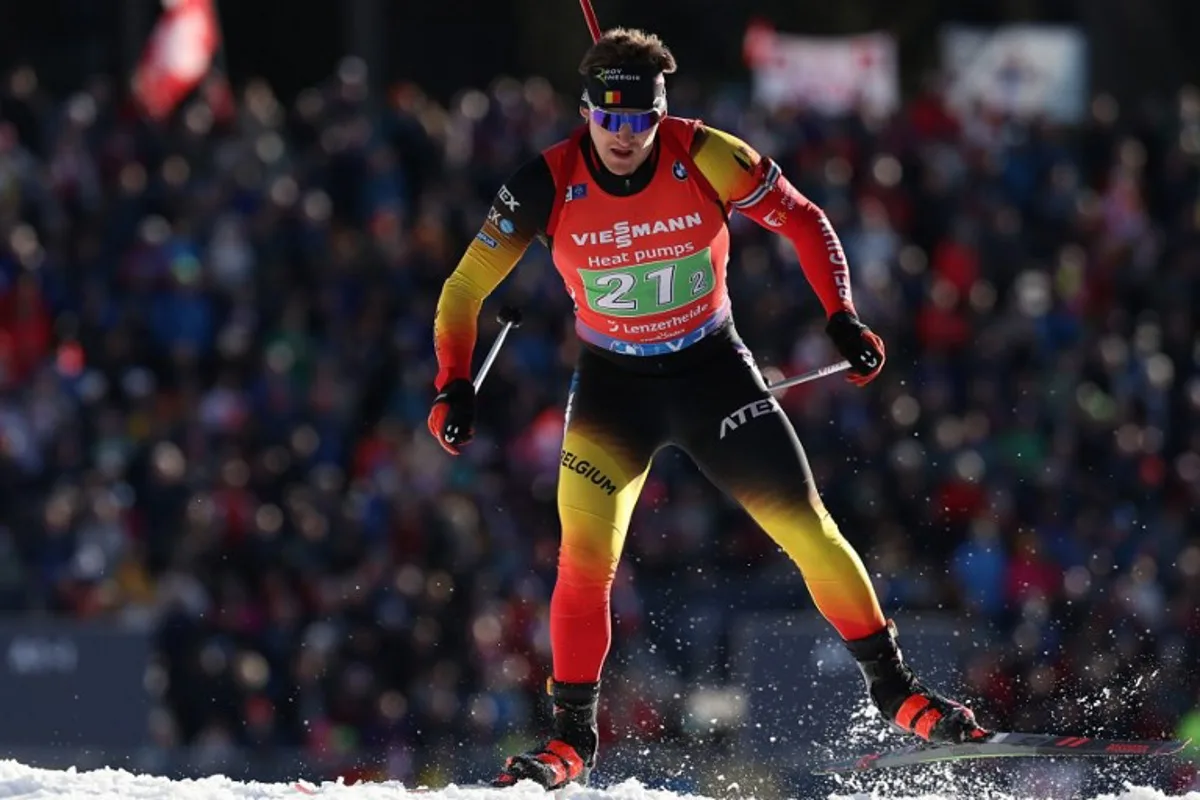 Belgium's Florent Claude competes in the Single Mixed Relay event of the IBU Biathlon World Championship of Lenzerheide, eastern Switzerland, on February 20, 2025. FRANCK FIFE / AFP