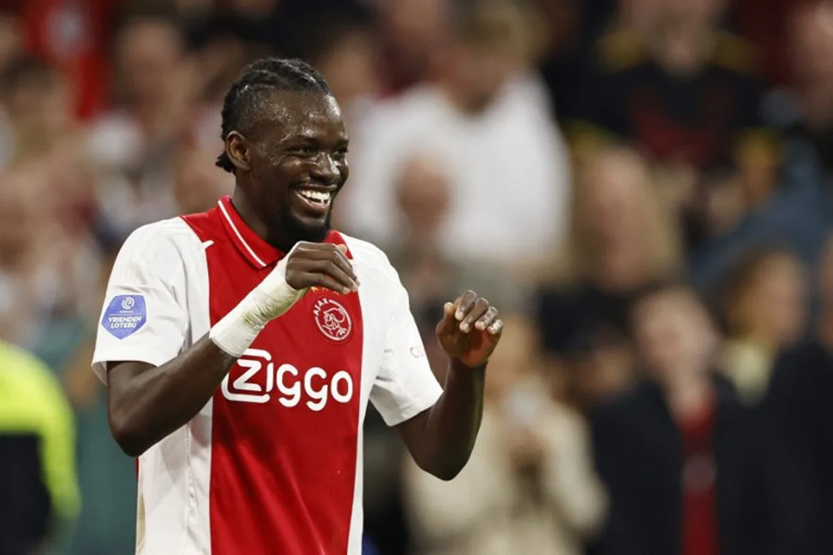 Ajax' Burkinabe forward #20 Bertrand Traore celebrates after scoring his team's second goal during the Dutch Eredivisie football match between Ajax Amsterdam and Fortuna Sittard at the Johan Cruijff ArenA on September 18, 2024 in Amsterdam.  MAURICE VAN STEEN / ANP / AFP