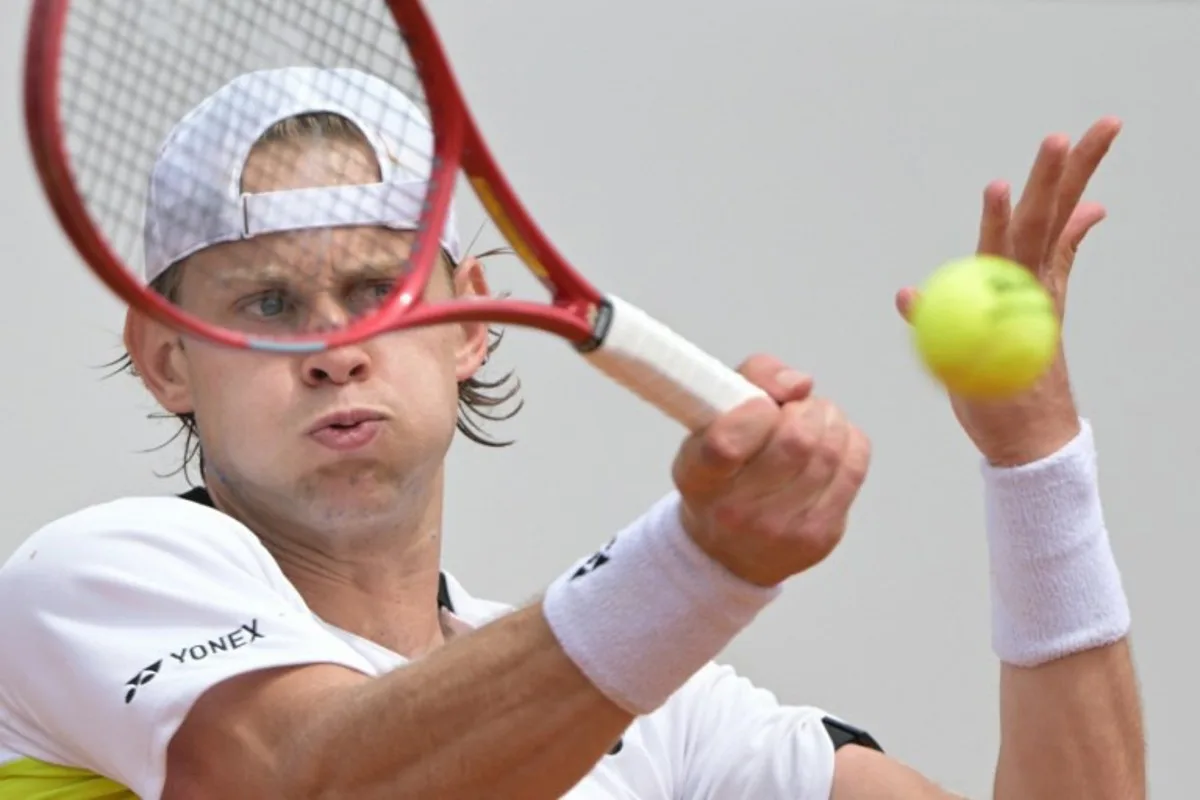 Belgium's Zizou Bergs returns the ball to France's Terence Atman during the ATP Rome Open tennis tournament at Foro Italico in Rome on May 7, 2026.   Tiziana FABI / AFP