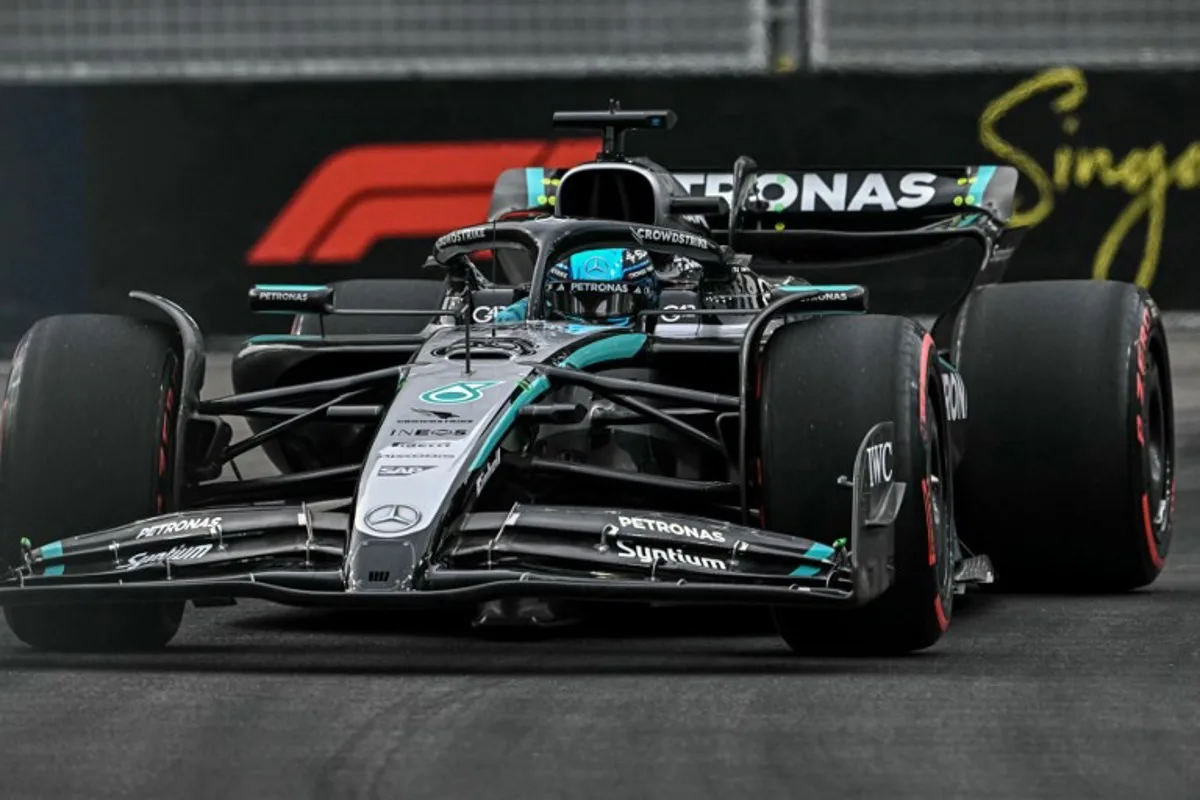 Mercedes' British driver George Russell drives during the third practice session ahead of the Formula One Singapore Grand Prix night race at the Marina Bay Street Circuit in Singapore on October 4, 2025. Lillian SUWANRUMPHA / AFP