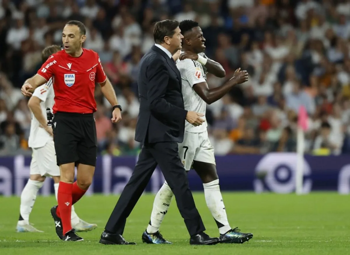 Real Madrid's Brazilian forward #07 Vinicius Junior reacts during the Spanish league football match between Real Madrid CF and Villarreal CF at the Santiago Bernabeu stadium in Madrid on October 5, 2024.  OSCAR DEL POZO / AFP