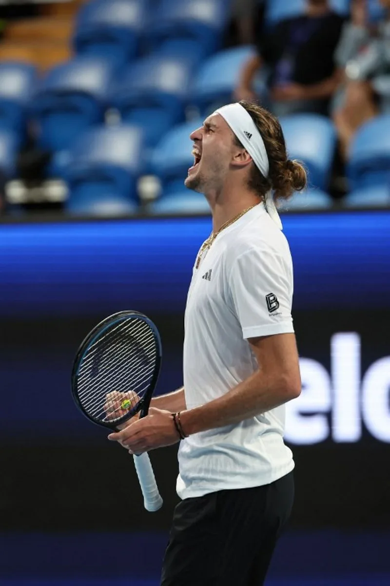 Germany's Alexander Zverev celebrates his win over China's Zhang Zhizhen during their men's singles match at the United Cup tennis tournament in Perth on December 30 2024.  COLIN MURTY / AFP