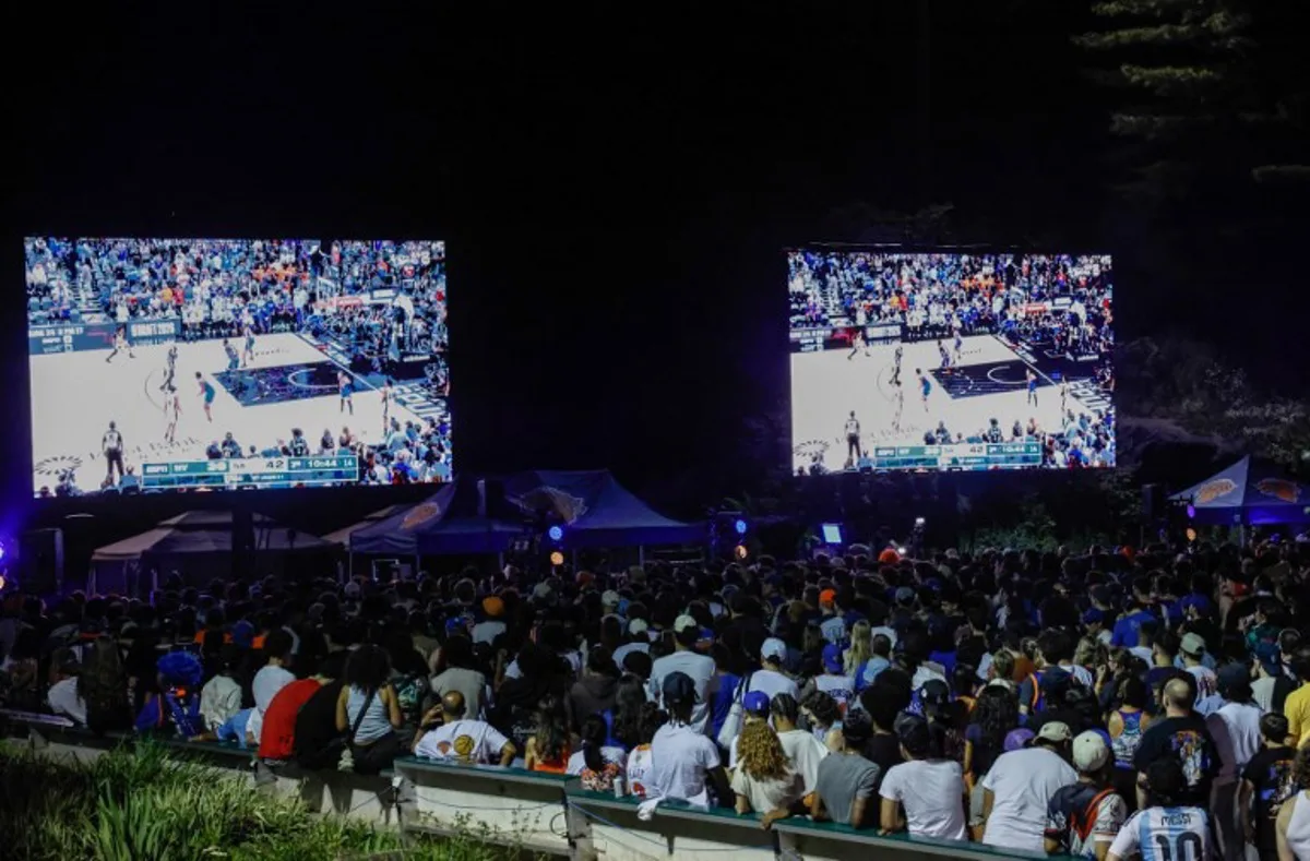 Knicks fans gather inside Wollman Rink in Central Park to watch Game 5 of the NBA finals between the New York Knicks and San Antonio Spurs, in New York, on June 13, 2026. kena betancur / AFP