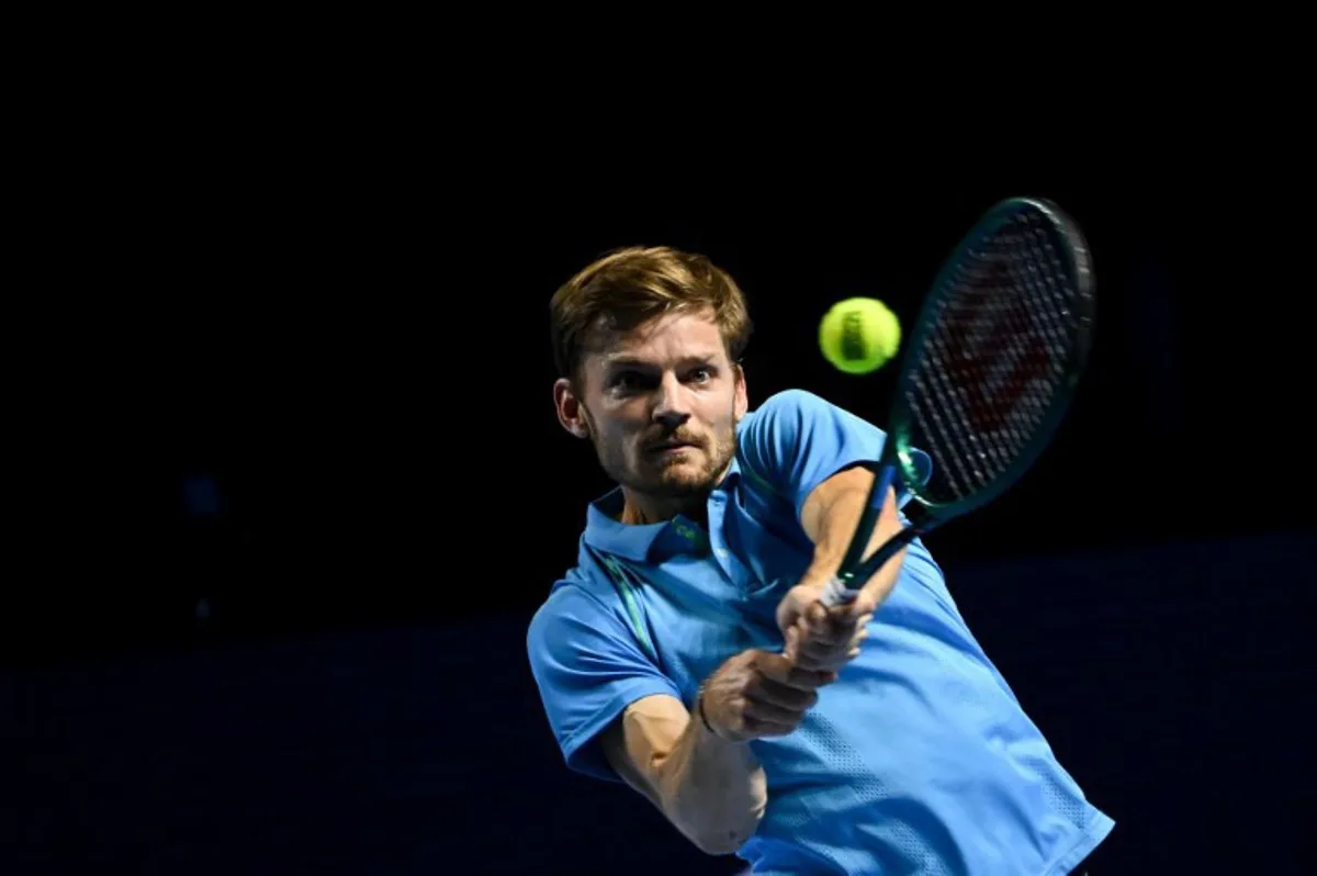 Belgium's David Goffin hits a return to Denmark's Holger Rune during their men's singles quarter-final match at the Swiss Indoors ATP 500 tennis tournament in Basel on October 25, 2024.  Fabrice COFFRINI / AFP