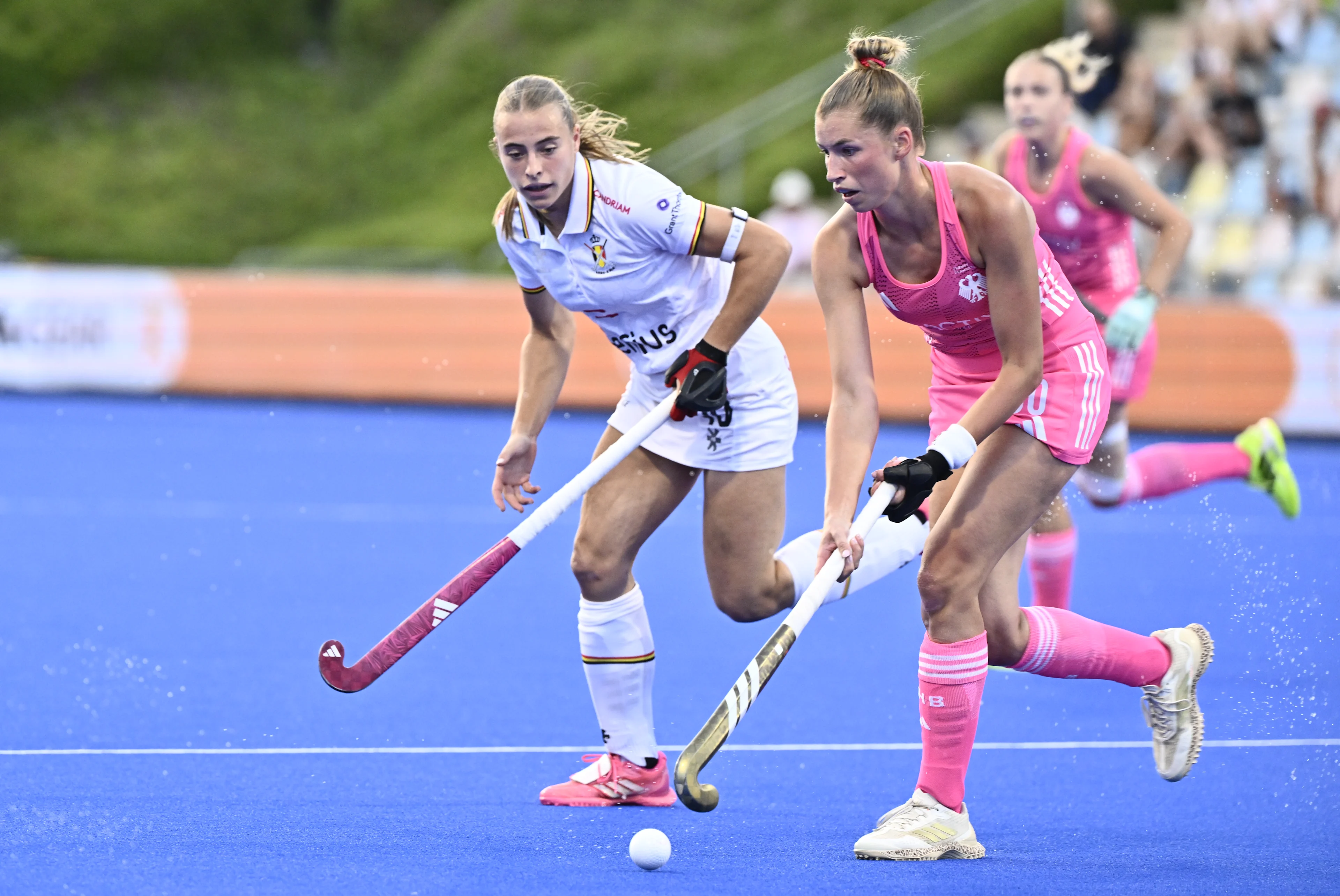 Belgium's Alix Gerniers and German player pictured in action during a hockey game between Germany and the Belgian national team Red Panthers, the semi-finals of the 2025 women's European championships, Friday 15 August 2025 in Monchengladbach, Germany. BELGA PHOTO ERIC LALMAND