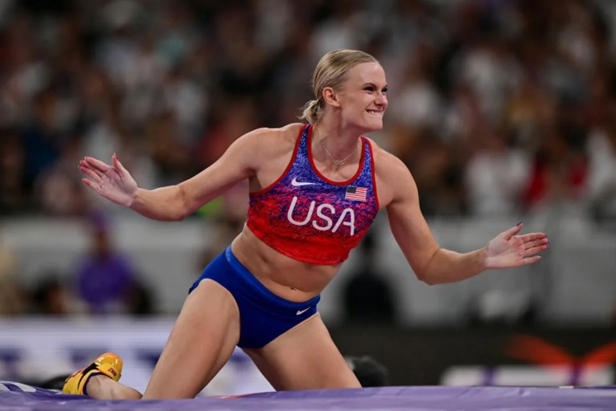 US' athlete Katie Moon celebrates clreaing the crossbar as she competes in the women's pole vault final during the World Athletics Championships in Tokyo on September 17, 2025. Ben STANSALL / AFP