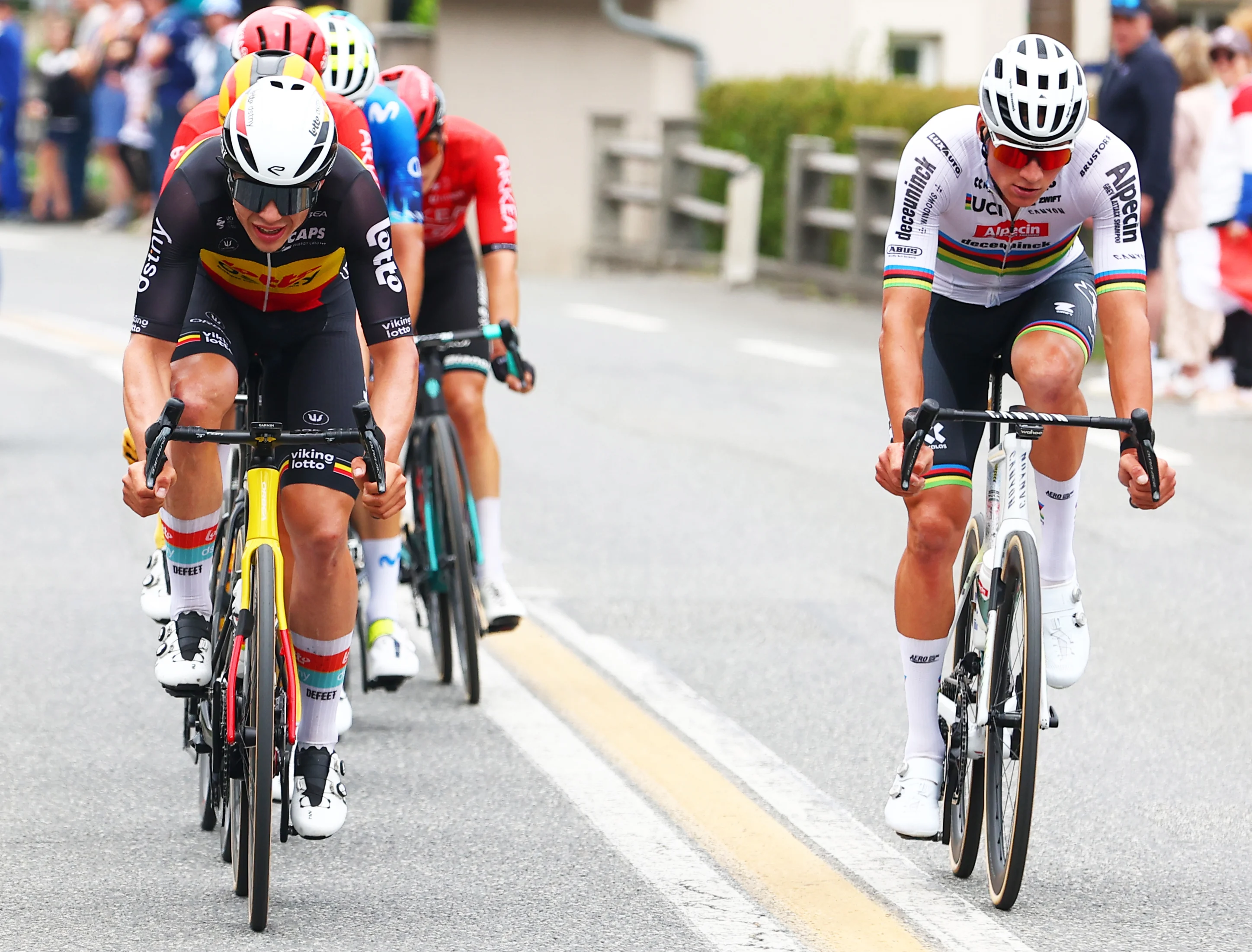 Belgian Arnaud De Lie of Lotto Dstny and Dutch Mathieu van der Poel of Alpecin-Deceuninck pictured in action during stage 14 of the 2024 Tour de France cycling race, from Pau to Saint-Lary-Soulan Pla d'Adet, France (151,9 km), on Saturday 13 July 2024. The 111th edition of the Tour de France starts on Saturday 29 June and will finish in Nice, France on 21 July.  BELGA PHOTO POOL LUCA BETTINI