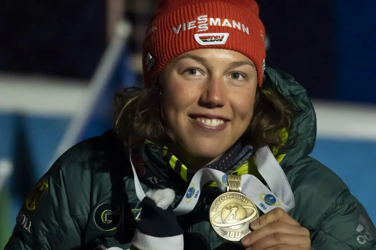 Third placed Germany's Laura Dahlmeier poses during the medal ceremony for the women's 7,5 km sprint event at the IBU Biathlon World Championships in Ostersund, Sweden, on March 8, 2019. Jonathan NACKSTRAND / AFP