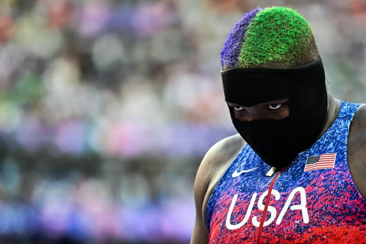 US' Raven Saunders reacts in the women's shot put final of the athletics event at the Paris 2024 Olympic Games at Stade de France in Saint-Denis, north of Paris, on August 9, 2024. Andrej ISAKOVIC / AFP