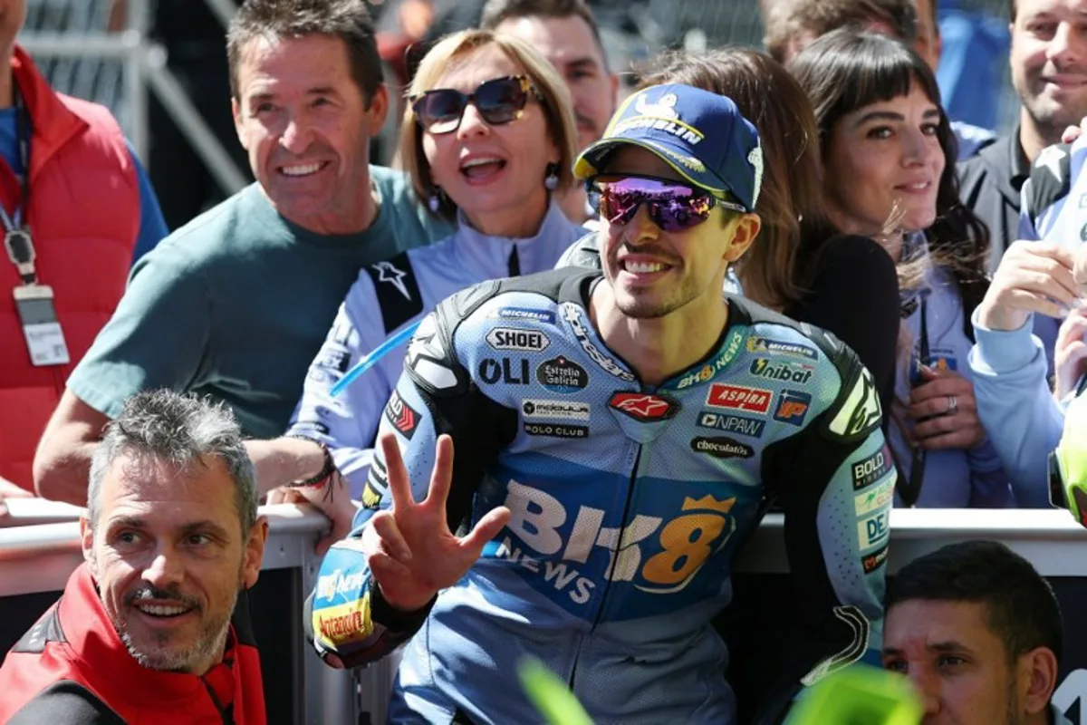 Team Gresini Racing MotoGP's Alex Marquez celebrates his second place after the qualifying session at the Catalunya Moto GP Grand Prix at the Catalunya racetrack in Montmelo, near Barcelona, on May 16, 2026.  Lluis GENE / AFP