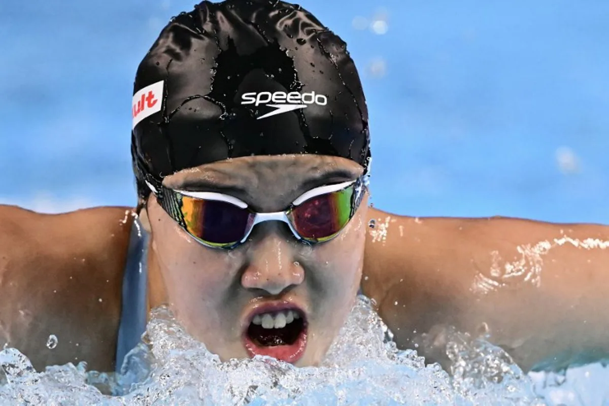 China's swimmer Yu Zidi competes in a heat of the women's 200m butterfly swimming event during the 2025 World Aquatics Championships in Singapore on July 30, 2025. MANAN VATSYAYANA / AFP