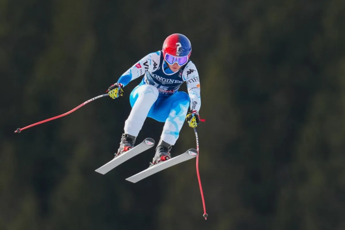 US' Lauren Macuga competes in the Downhill run of the Women's Team Combined event of the Saalbach 2025 FIS Alpine World Ski Championships in Hinterglemm on February 11, 2025.  Dimitar DILKOFF / AFP