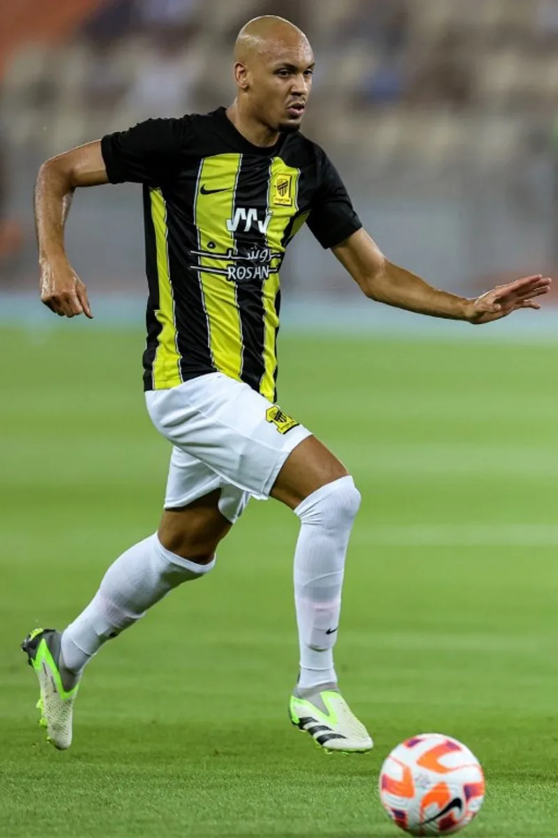 Ittihad's Brazilian midfielder #08 Fabinho runs with the ball during the Saudi Pro League football match between Al-Ittihad and Al-Hilal at Prince Abdullah al-Faisal Stadium in Jeddah on September 1, 2023.  AFP