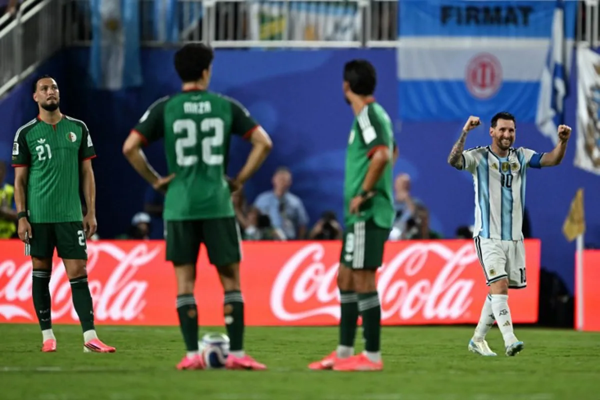 Argentina's forward #10 Lionel Messi celebrates scoring his team's third goal during the 2026 World Cup Group J football match between Argentina and Algeria at the Kansas City Stadium in Kansas City on June 16, 2026. ROBERTO SCHMIDT / AFP
