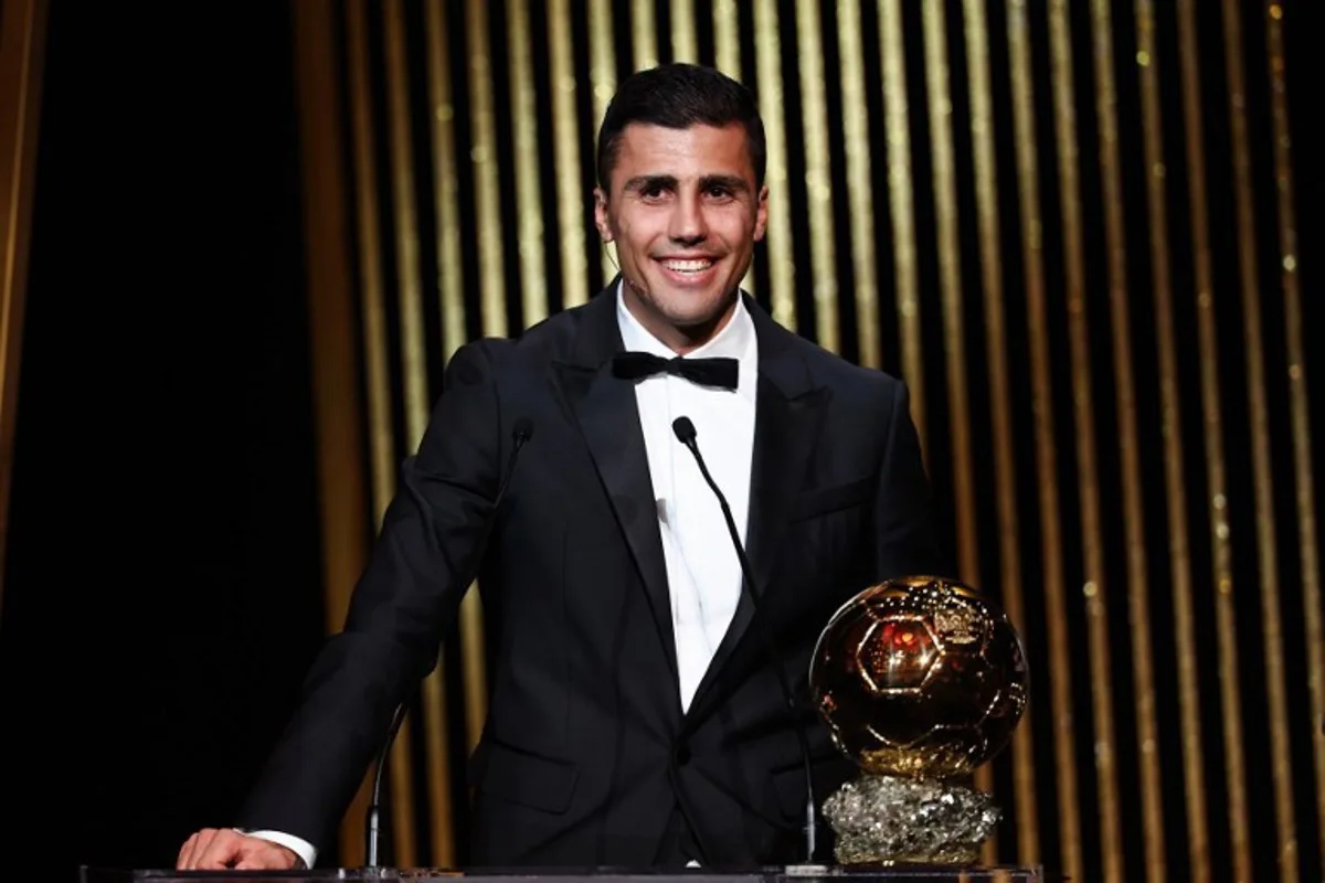 Manchester City's Spanish midfielder Rodri receives the Ballon d'Or award during the 2024 Ballon d'Or France Football award ceremony at the Theatre du Chatelet in Paris on October 28, 2024.  FRANCK FIFE / AFP