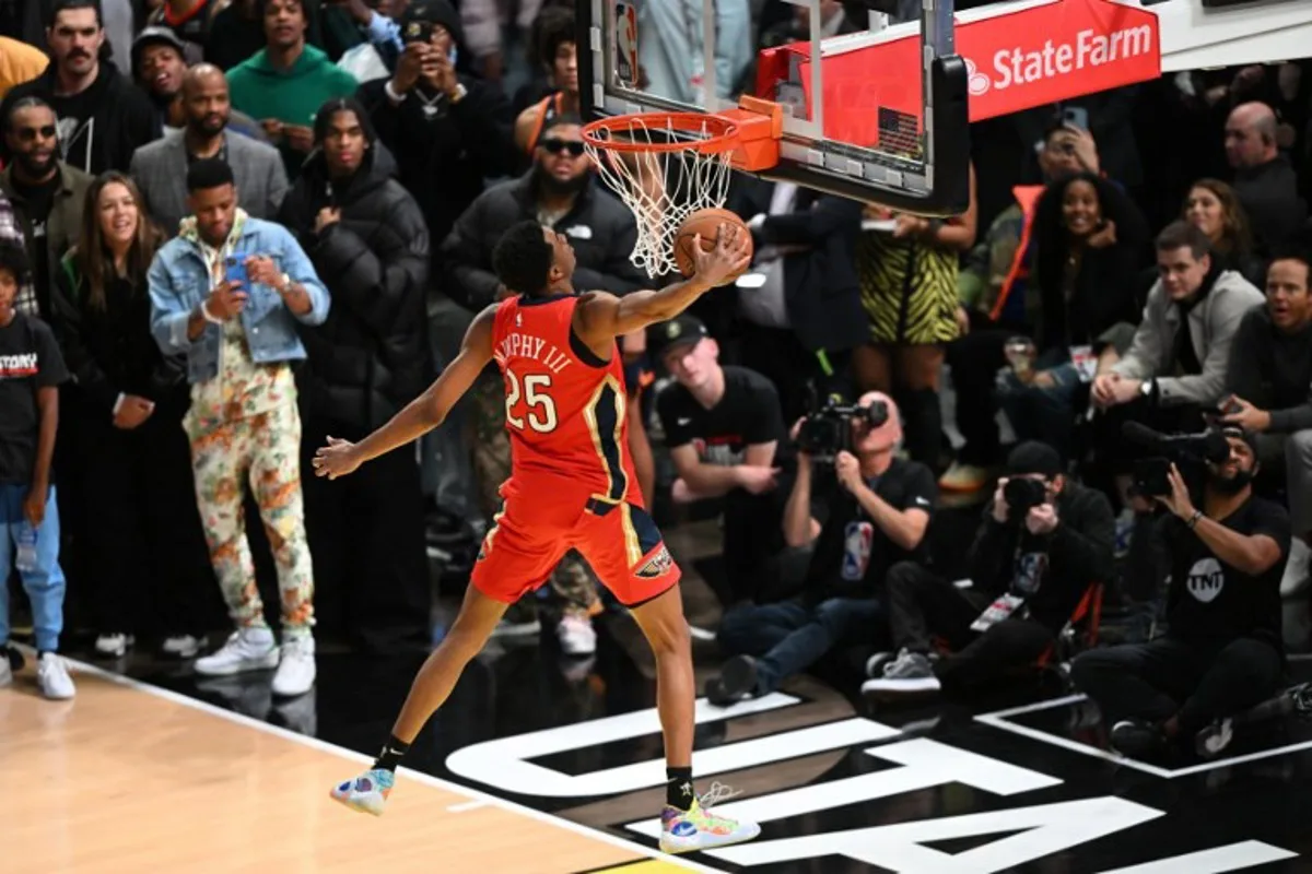 Basketball player Trey Murphy III, of the New Orleans Pelicans, competes during the Slam Dunk Contest of the NBA All-Star week-end in Salt Lake City, Utah, February 18, 2023. Patrick T. Fallon / AFP
