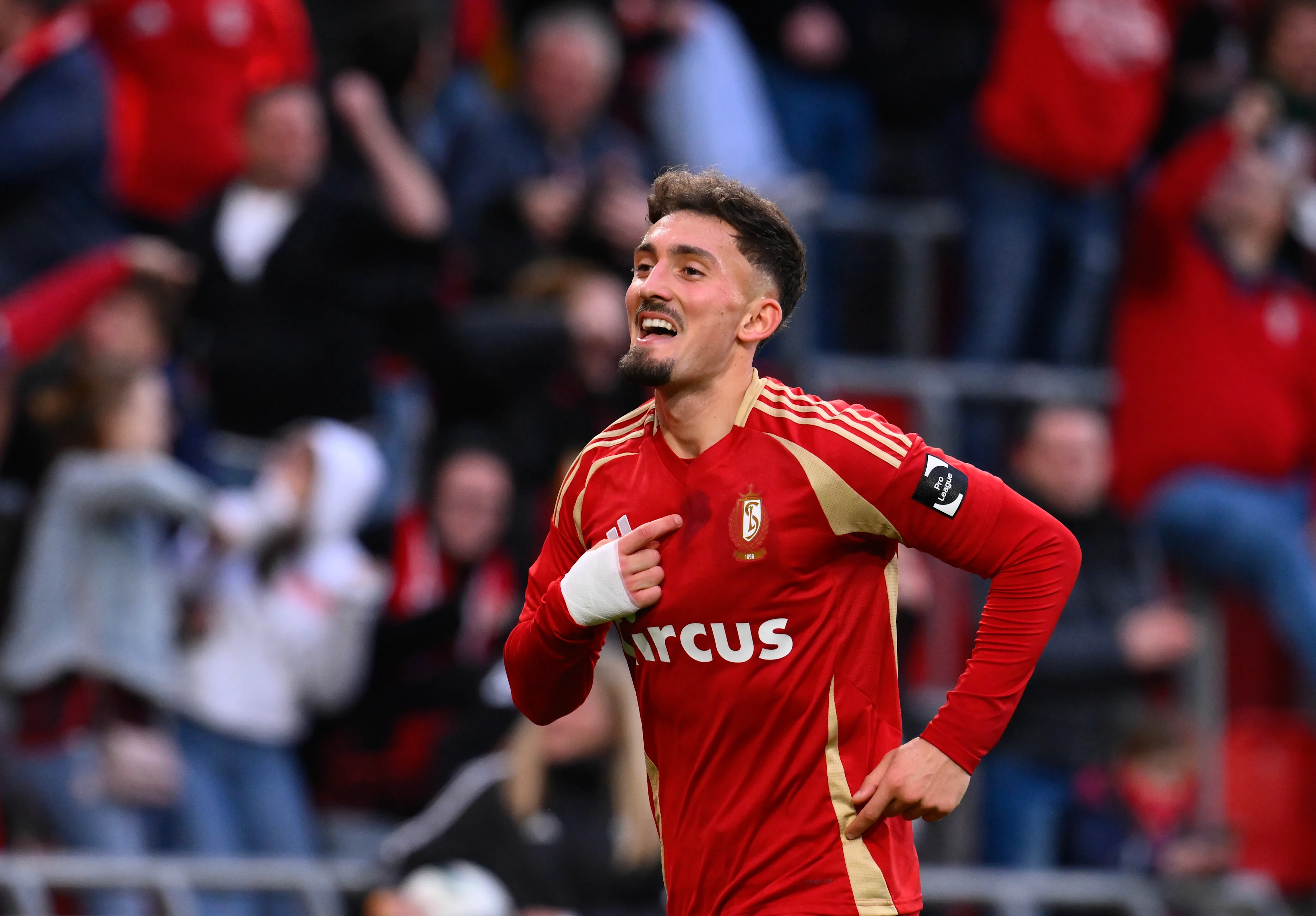 Standard's Andi Zekiri celebrates after scoring during a soccer match between Standard de Liege and Sint-Truidense VV, Saturday 02 November 2024 in Liege, on day 13 of the 2024-2025 season of the 'Jupiler Pro League' first division of the Belgian championship. BELGA PHOTO JOHN THYS