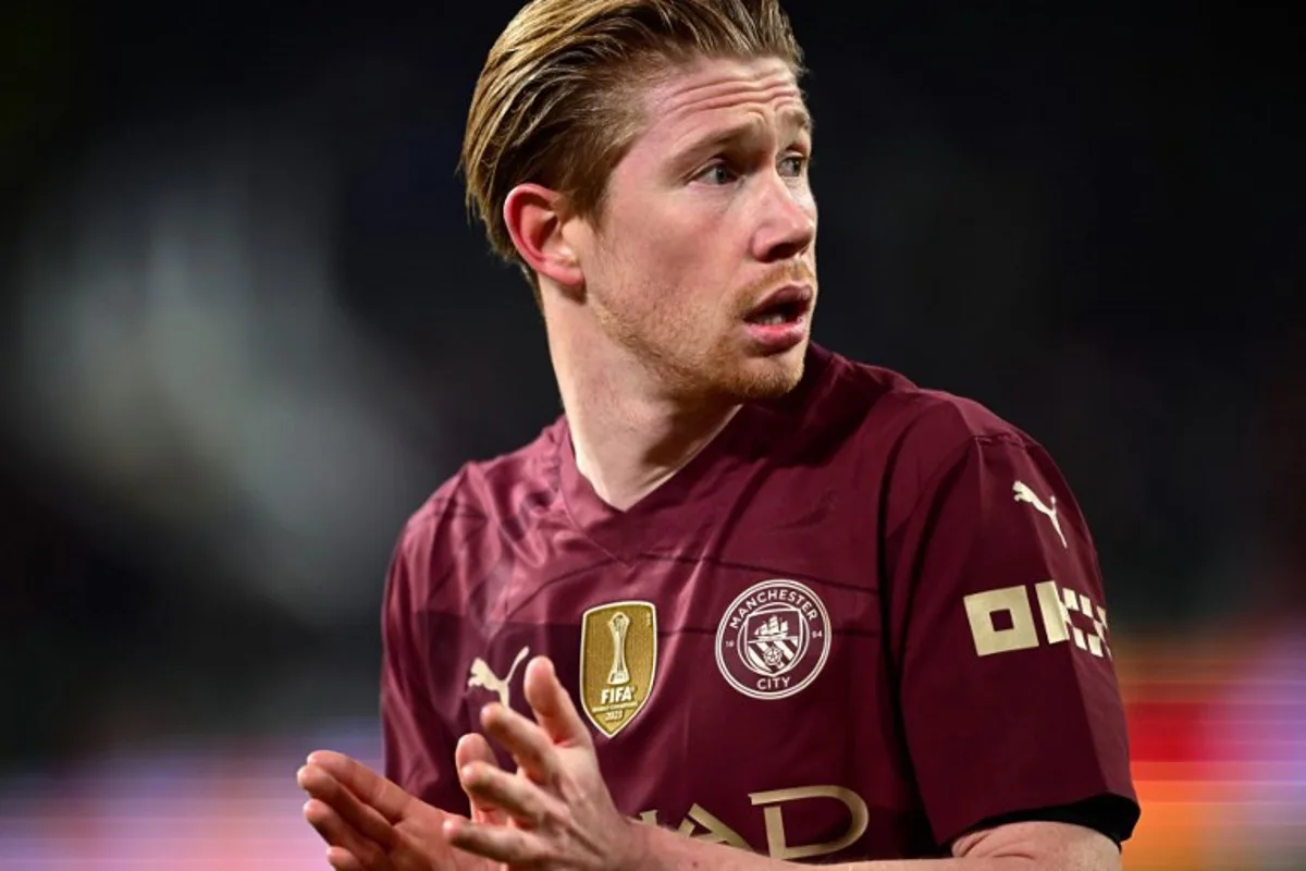 Manchester City's Belgian midfielder #17 Kevin De Bruyne reacts during the UEFA Champions League, league phase day 6, football match between Juventus (ITA) and Manchester City (ENG) at the Allianz stadium in Turin, on December 11, 2024.  Marco BERTORELLO / AFP