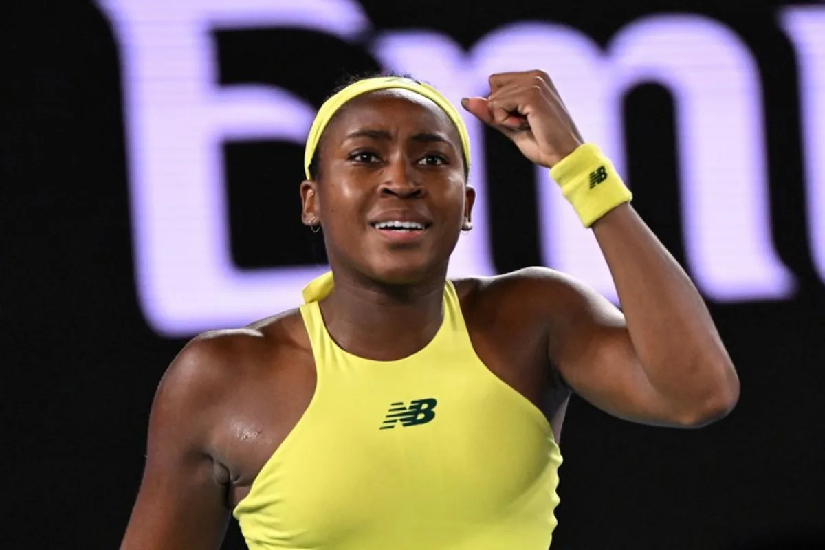 USA's Coco Gauff celebrates beating Britain's Jodie Burrage in their women's singles match on day four of the Australian Open tennis tournament in Melbourne on January 15, 2025.  WILLIAM WEST / AFP