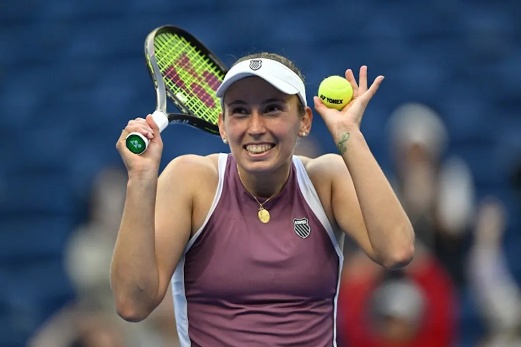 Belgium's Elise Mertens reacts as she celebrates her victory against USA's Coco Gauff during their women's singles match at the China Open tennis tournament in Beijing on October 7, 2026. Adek BERRY / AFP
