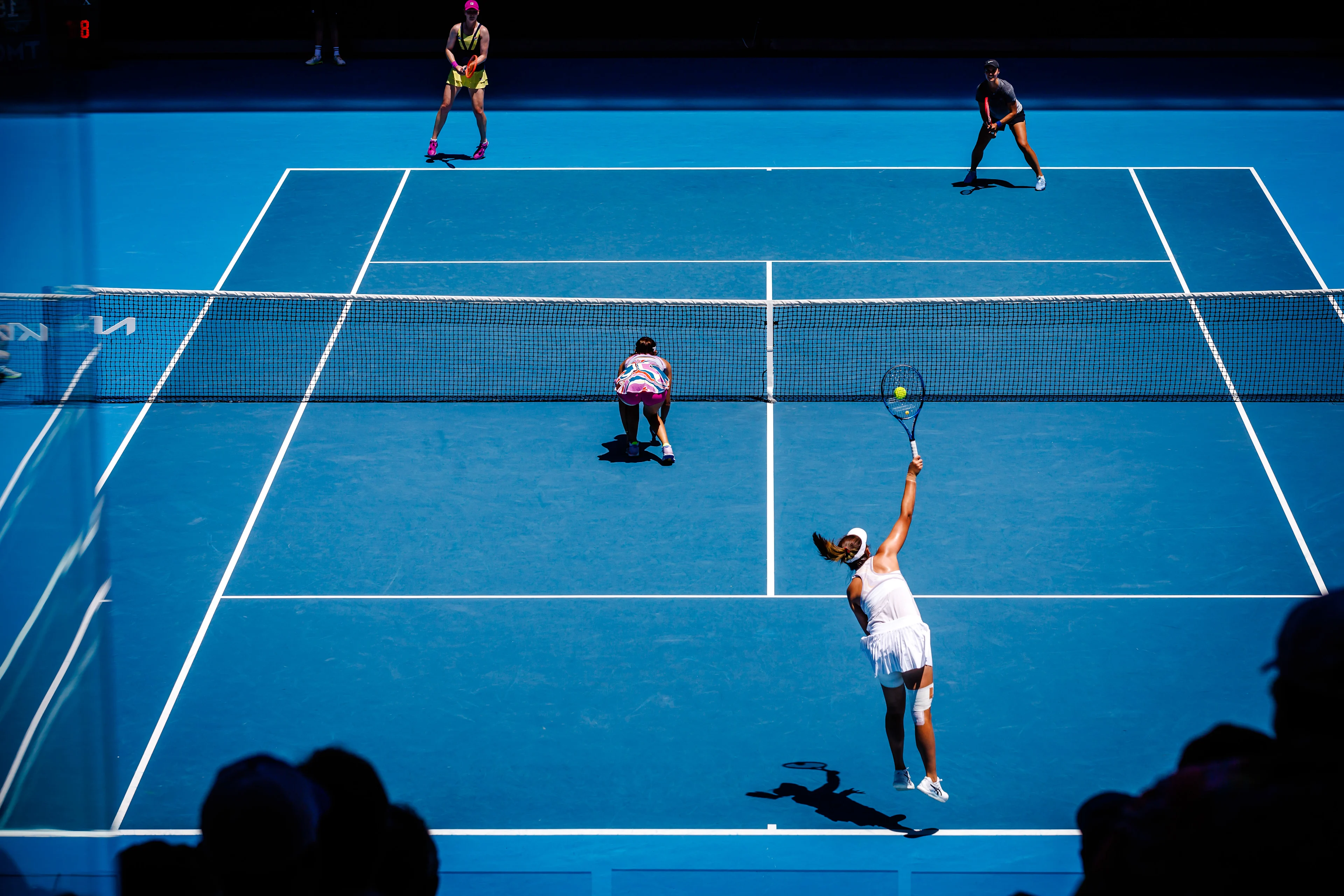 Alison Van Uytvanck (WTA 68) and Anhelina Kalinina (WTA 340) (top) pictured during a women's doubles third round game between Belgian-Ukrainian pair Van Uytvanck-Kalinina and Tawain-China pair Chan-Yang at the 'Australian Open' tennis Grand Slam, Monday 23 January 2023 in Melbourne Park, Melbourne, Australia. BELGA PHOTO PATRICK HAMILTON