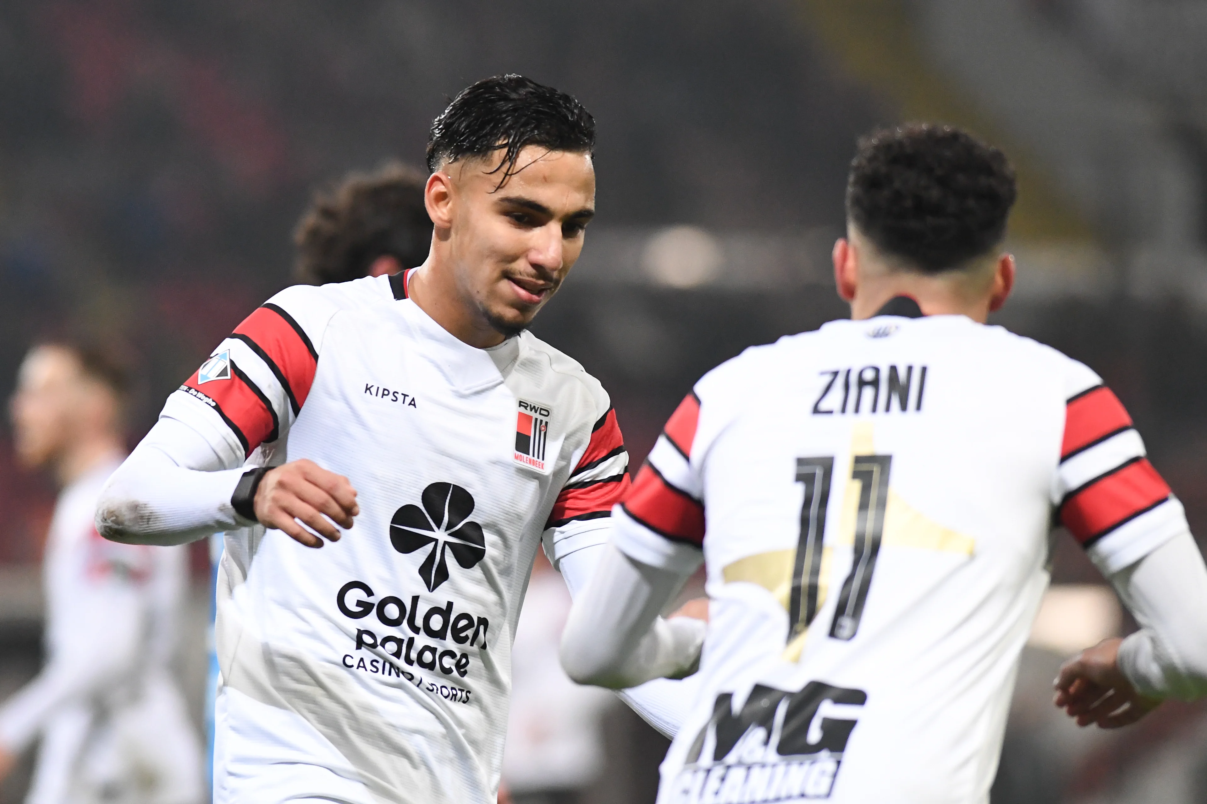 Rwdm's Achraf Laaziri and Rwdm's Ilyes Ziani pictured during a soccer match between RWD Molenbeek and Club NXT, Sunday 15 December 2024 in Brussels, on day 15 of the 2024-2025 'Challenger Pro League' 1B second division of the Belgian championship. BELGA PHOTO JILL DELSAUX