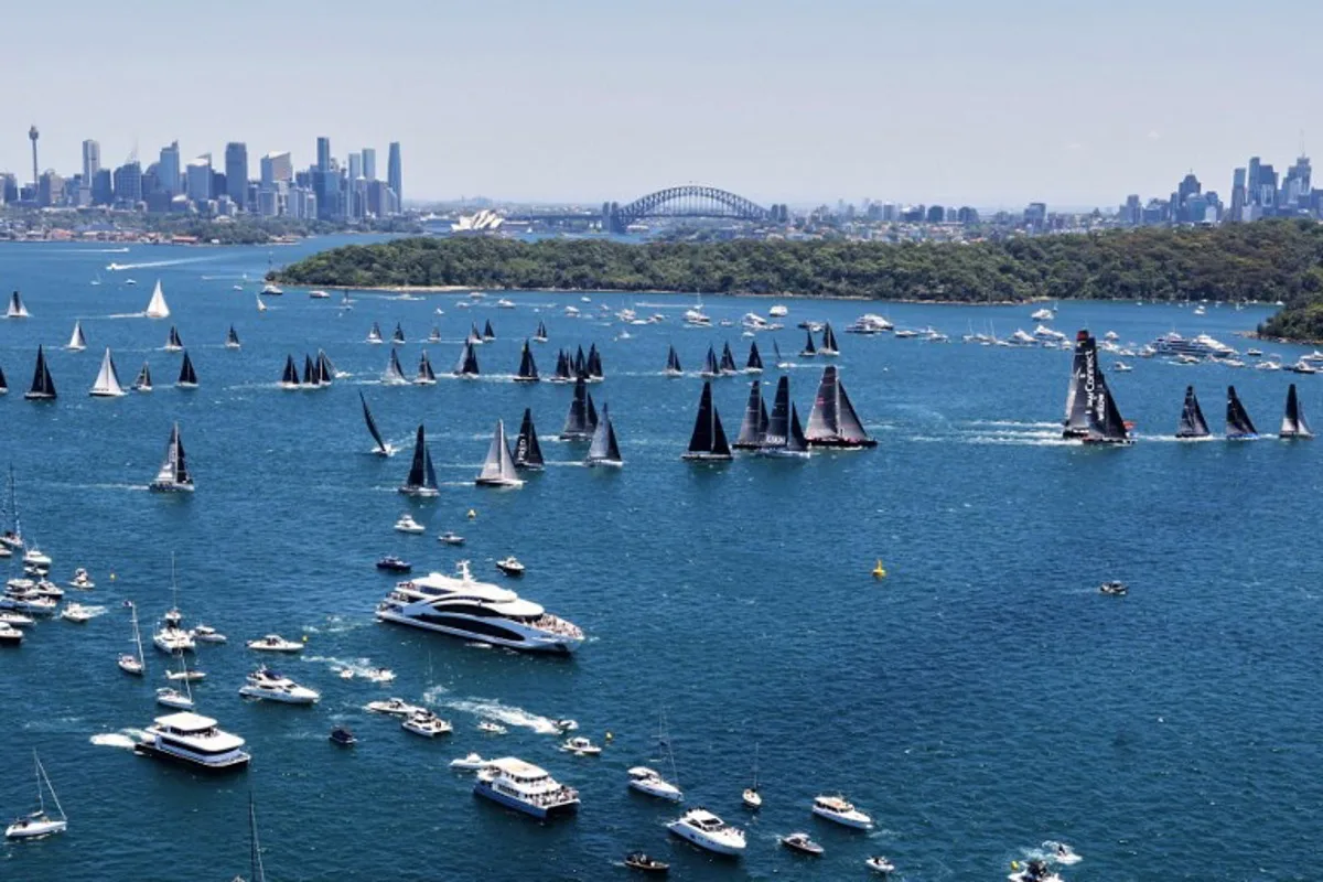 This handout image taken and received from Rolex on December 26, 2024 shows yachts competing at the start of the annual Sydney to Hobart yacht race on Boxing Day on Sydney Harbour.  Carlo Borlenghi / ROLEX / AFP