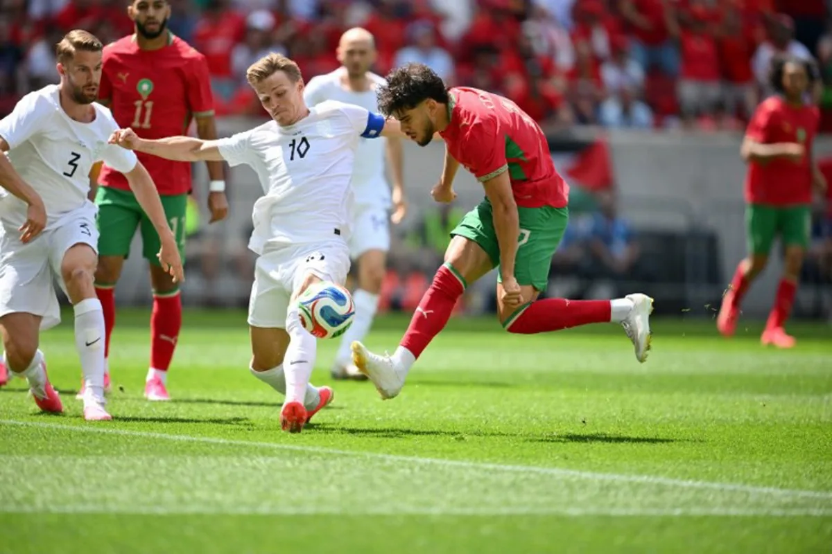 Morocco's midfielder #17 Abde Ezzalzouli shoots on goal during the international friendly football match between Morocco and Norway at Sports Illustrated Stadium in Harrison, New Jersey, on June 7, 2026. ANGELA WEISS / AFP