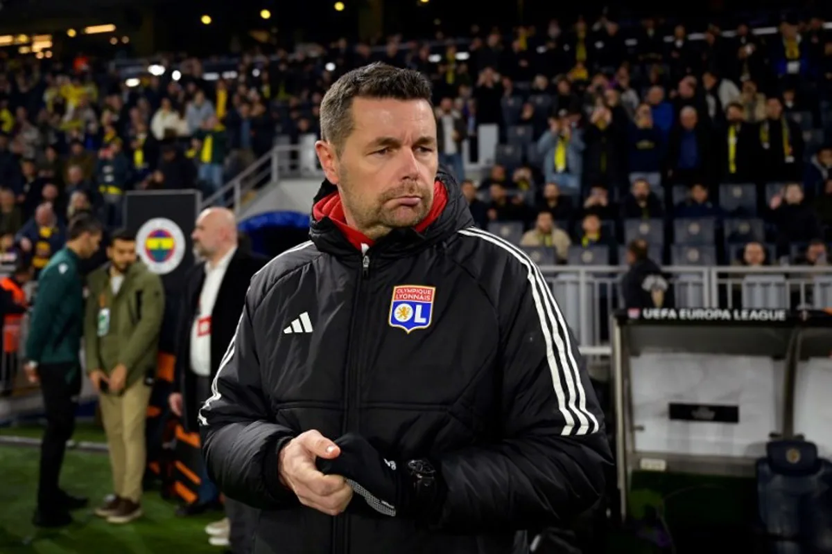 Lyon's French head coach Pierre Sage looks on before the start of the UEFA Europa League, league phase football match between Fenerbahce and Olympique Lyonnais (OL) at the Sukru Saracoglu Stadium in Istanbul on January 23, 2025.  Yasin AKGUL / AFP