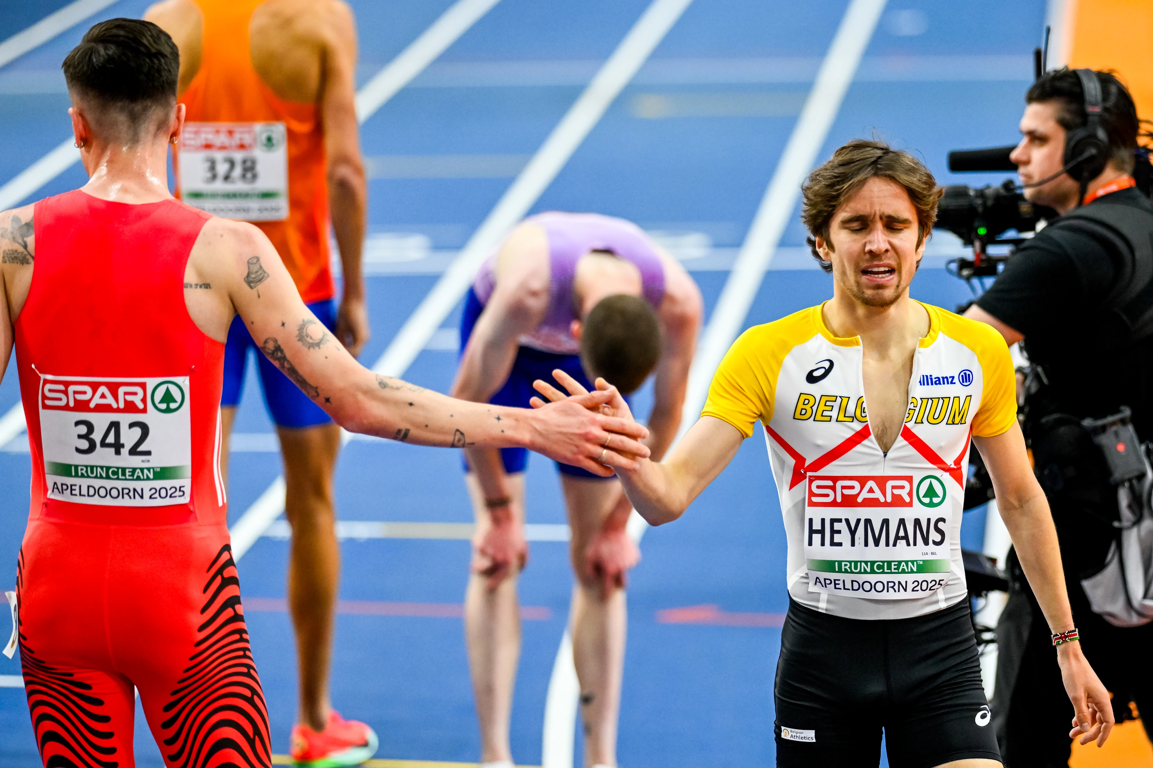 Norwegian Jakob Ingebrigtsen and Belgian John Heymans pictured after the European Athletics Indoor Championships, in Apeldoorn, The Netherlands, Saturday 08 March 2025. The championships take place from 6 to 9 March. BELGA PHOTO ERIC LALMAND