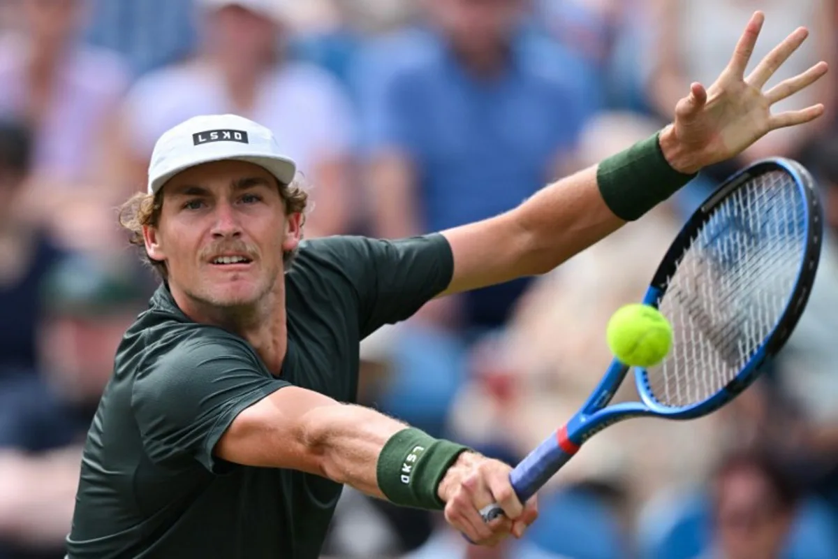 Australia's Max Purcell returns against US player Taylor Fritz during their men's singles final tennis match at the Rothesay Eastbourne International tennis tournament in Eastbourne, southern England, on June 29, 2024.  Glyn KIRK / AFP