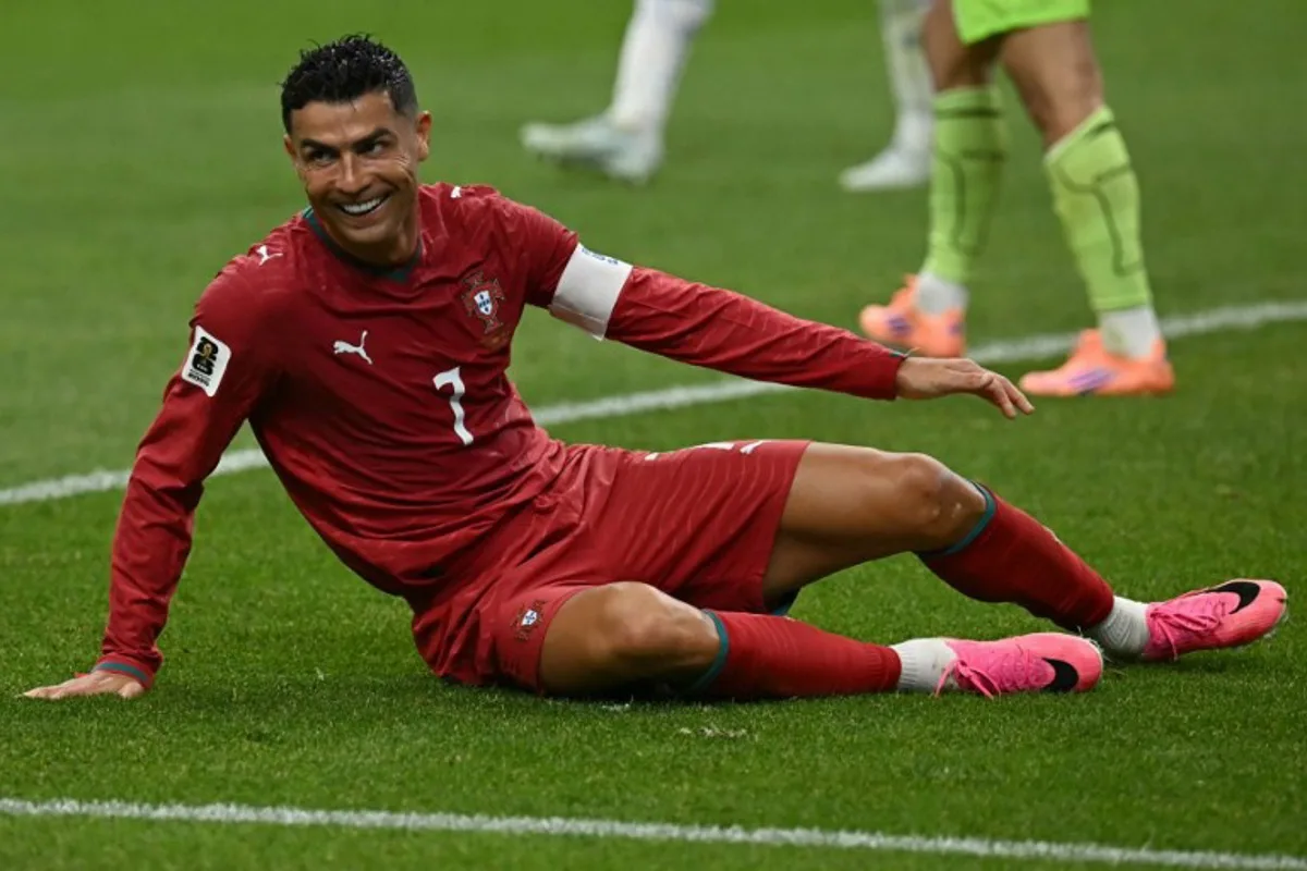 Portugal's forward #07 Cristiano Ronaldo reacts to a missed chance during the 2026 World Cup Group K football match between Portugal and Uzbekistan at the Houston Stadium in Houston on June 23, 2026. Paul ELLIS / AFP