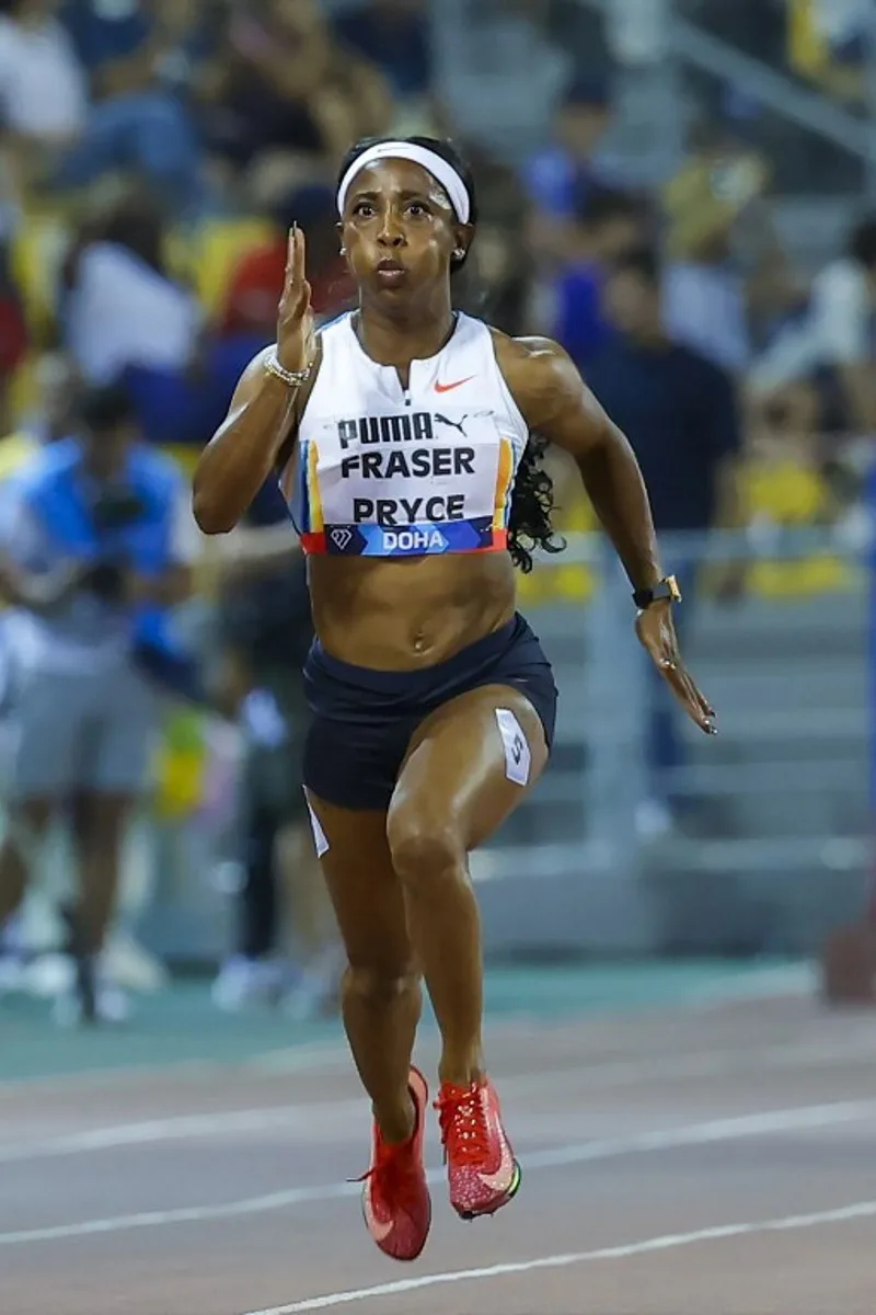 Jamaica's Shelly-Ann Fraser-Pryce competes in the women's 100m final during the IAAF Diamond League competition at the Suheim Bin Hamad Stadium in Doha on May 16, 2025. Karim JAAFAR / AFP