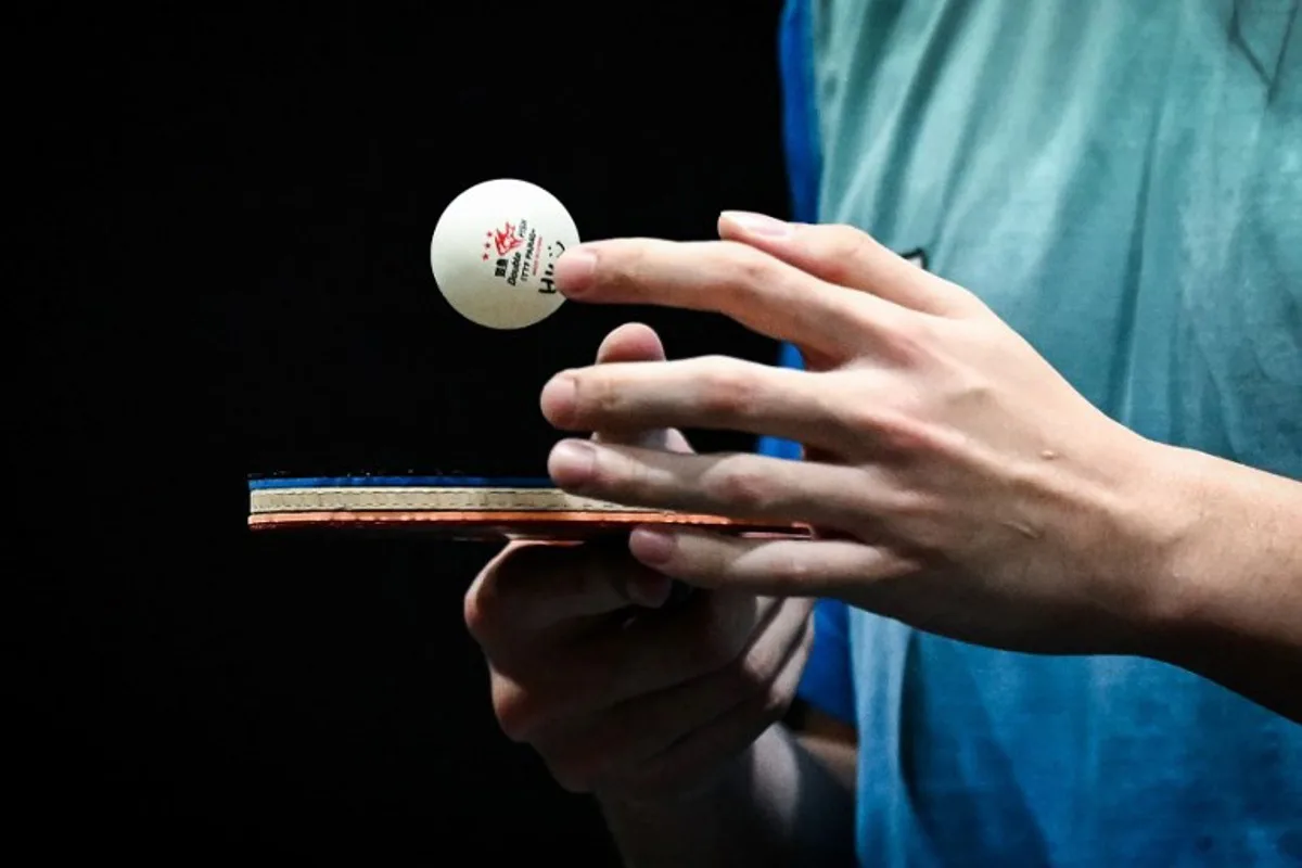 Hong Kong Yiu Kwan To takes part in a training session with Hong Kong's Wong Chun during the third day of the table tennis competition at the Paris 2024 Olympic Games at the South Paris Arena in Paris on July 29, 2024.  Ben STANSALL / AFP