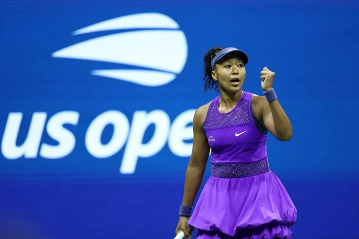 Japan's Naomi Osaka celebrates a point against Czech Republic's Karolina Muchova during their women's singles quarterfinal tennis match on day eleven of the US Open tennis tournament at the USTA Billie Jean King National Tennis Center in New York City on September 3, 2025. CHARLY TRIBALLEAU / AFP