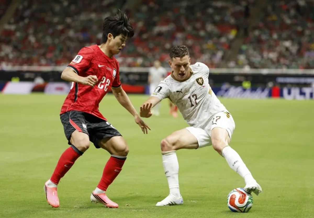 South Korea's defender #22 Seol Young-woo and Czech Republic's midfielder #17 Lukas Provod fight for the ball during the 2026 World Cup Group A football match between South Korea and the Czech Republic at the Guadalajara Stadium in Zapopan on June 11, 2026. Ulises RUIZ / AFP